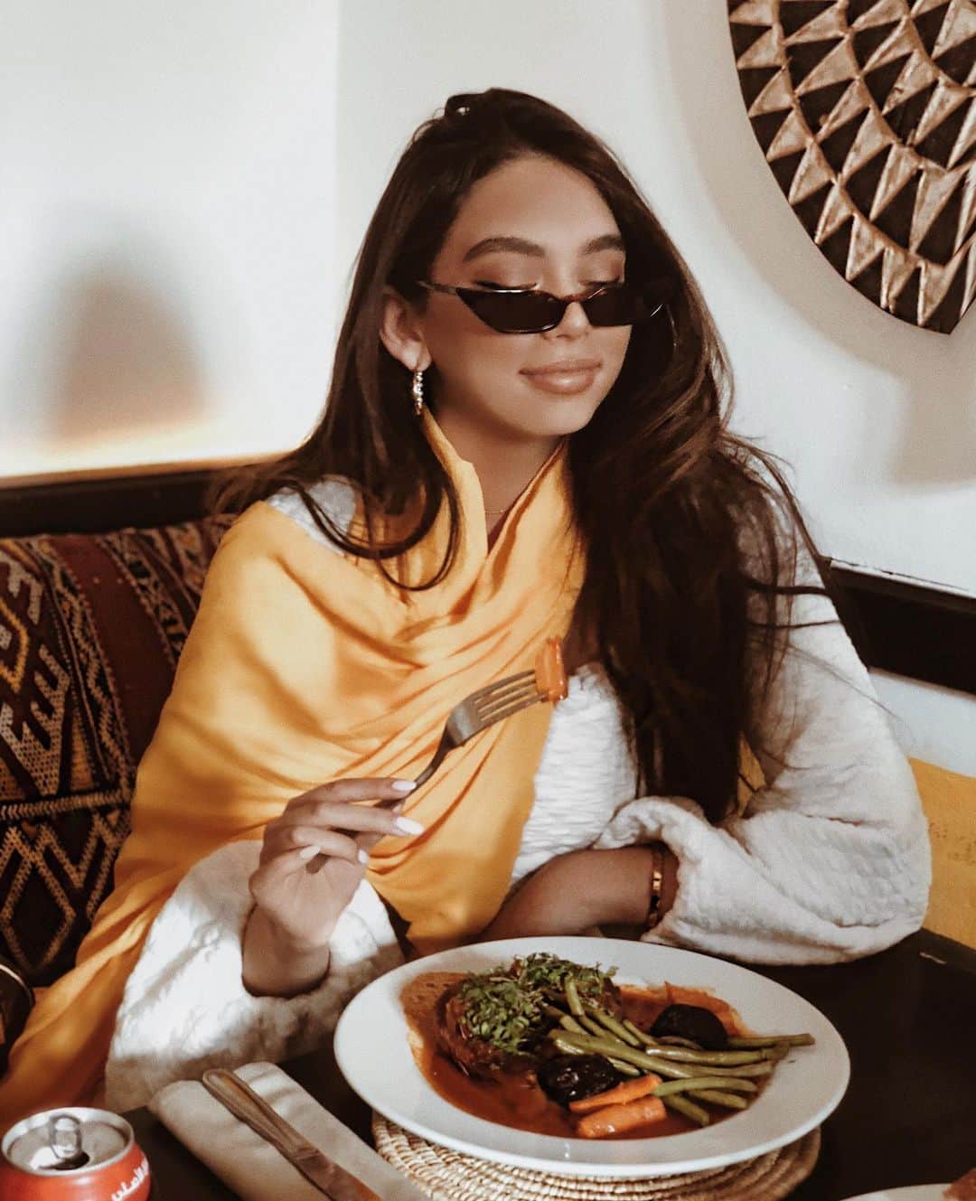 JANICE JOOSTEMAさんのインスタグラム写真 - (JANICE JOOSTEMAInstagram)「Memories from Morocco 🇲🇦 This was one of the most memorable and fun trips.. even though James and I were so ill because we went straight from Coachella to Morocco and everyone at Coachella got sick because we were all sharing so many drinks and partying too hard.  But Marrakech definitely holds a special place in my heart, so grateful to have made such an amazing trip like that happen with @doina and @danielpdykes.  The first night was magical, we went to a hidden restaurant in a creepy alley way and as the door opened, it was so lively. There were women in beautiful outfits dancing, the food was phenomenal. We walked through rose fields and had tea parties on the grass laying on layers of blankets and pillows. We drove 6 hours away through the Atlas Mountains which was terrifying as the roads were so thin and you could barely see 10 feet in front of you to see where they filmed Game of Thrones and I fell in love with a baby goat. I fell in a muddy river. We stayed in the most beautiful Moroccan home courtesy of our friend and ate the most delicious food every meal. We saw so much beautiful art and became pros at going to the souk market. We stayed at beautiful hotels in between. We watched Game of Thrones and drank wine while it rained loudly outside. We spent the night in a Glam tent with plumbing in the middle of nowhere and we drank so much and danced the night away to the point I was throwing up and had to get on a camel at 7am which was worth it. We then had a beautiful lunch overlooking rolling hills and watched a clever camel get out and run away. We spent nights staying in and hanging out near the pool in our garden just talking, dancing and laughing. I feel so grateful to have so many beautiful memories with James and so many of our friends. I can’t wait to make more 😭💕💕💕 #thankstotravel」4月15日 4時47分 - janicejoostemaa