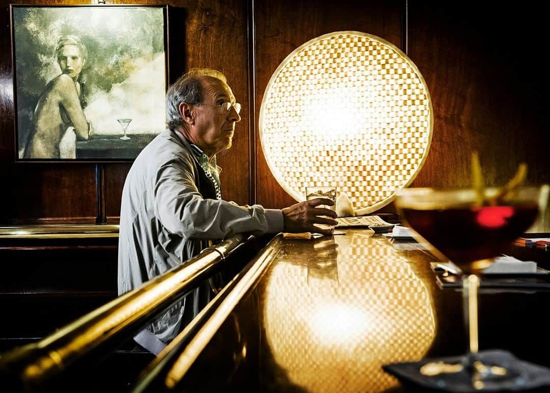 National Geographic Travelさんのインスタグラム写真 - (National Geographic TravelInstagram)「Photo by @dina_litovsky | A throwback to before social distancing time when I did a tour of Barcelona's speakeasies while photographing the city for National Geographic Traveler. This man having a drink at the Dirty Martini cocktail bar in the Eixample district was my favorite image of those late-night adventures. For more photos, follow me @dina_litovsky.」4月13日 13時10分 - natgeotravel