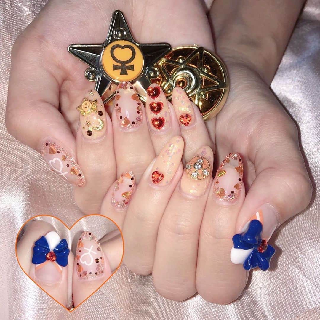 のインスタグラム：「セーラーヴィーナスネイル🧡✩˳॰̥* かなりかわいい！！ . 久しぶり～(⸝⸝⸝´꒳`⸝⸝⸝)今日から3月の投稿しようかな～ . . #nail #newnail  #セーラームーン #セーラームーンネイル #セーラーヴィーナス  #セーラーヴィーナスネイル #さきぼんネイル💅」