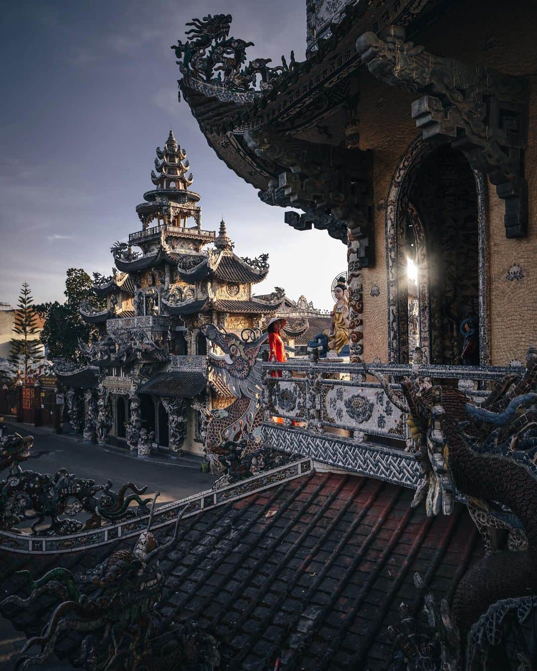 のインスタグラム：「The sunlight shines through the incomparable temple peacefully. She prays for glorious courage and strength to overcome all. #hellofrom Da Lat Vietnam ・ ・ ・ ・ #bestvacations #beautifuldestinations #earthfocus #earthoffcial #earthpix #thegreatplanet #discoverearth #fantastic_earth #awesome_earthpix #ourplanetdaily #lifeofadventure #theweekoninstagram  #theglobewanderer #visualambassadors #stayandwander #welivetoexplore #IamATraveler #wonderful_places #TLPics #visit #voyaged #sonyalpha #bealpha #aroundtheworldpix #moodygrams #streets_vision #HYPEBEAST #lonelyplanet #@sonyalpha @hypebeast @highsnobiety @lightroom @soul.planet @earthfever @9gag」