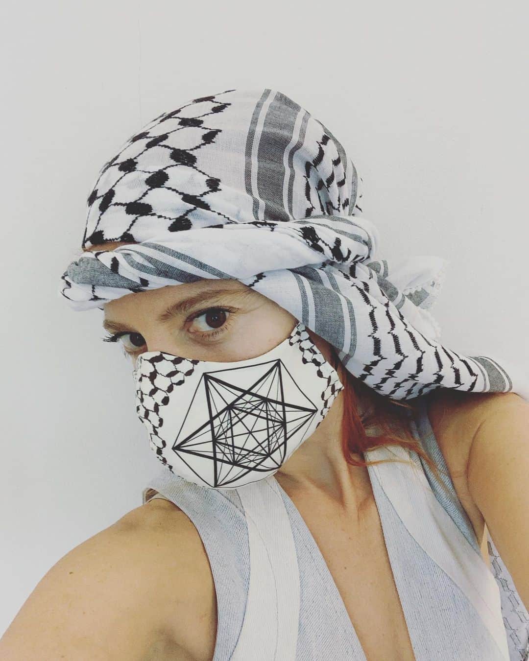 スリーアズフォーのインスタグラム：「Now Available on our shop Link in Bio “inSALAAM inSHALOM” Mask! Featuring threeASFOUR's iconic print from 2012 collection "inSALAAM inSHALOM", celebrating the textiles of both Arabic and Jewish cultures by mixing the geometric patterns of the TWO worlds and uniting them as ONE !  We are donating 10% of each purchase towards creating medical masks for  the support of the health community in New York City  All masks are limited edition - One of A kind ! #mask」