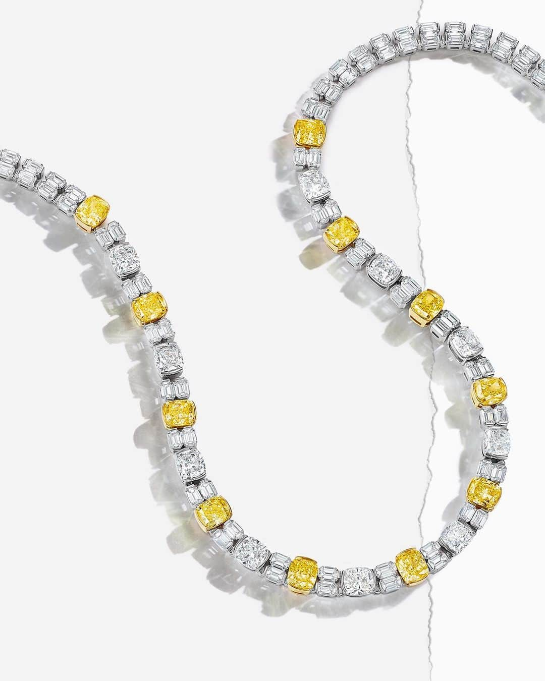 ティファニーさんのインスタグラム写真 - (ティファニーInstagram)「A traditional silhouette takes an unexpected turn in this necklace designed by Chief Artistic Officer #ReedKrakoff for the Extraordinary Tiffany: High Jewelry Collection Spring 2020. Fancy Intense Yellow diamonds of over 13 total carats and white diamonds of over 30 total carats are interspersed to create a striking contrast between the soft lines of the cushion-cut stones and the more angular baguettes. #TiffanyHighJewelry ——— Love and optimism have always been at the heart of Tiffany & Co. Now more than ever, we believe in dreams.」3月29日 20時00分 - tiffanyandco