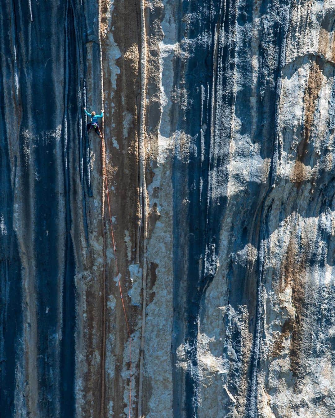 エミリー・ハリントンのインスタグラム：「#RequiredRewind France 2014 📸 @ladzinski of me on “Tom et Je Ris” (8b+/14a) in the Verdon Gorge. Home to thousands of routes, the limestone canyon is famous for its deep climbing history. I travelled there with @mattsegal @ladzinski @andrewbisharat and @etteloc for a @natgeo project on the history of the place and how it shaped modern-day sport climbing [🎥Link in Profile]  T&J is considered not only one of the best single pitches in the world but also a wild experience unlike any “normal” sport climb. Bolted/FA’d by the legendary Bruno Clement, the route starts at a hanging belay 300ft off the ground in the middle of the wall and follows a series of massive tufas that snake their way to the top of the cliff for 200ft. Like everything in the Verdon, one must rappel from the top, pull the rope, and climb out. The exposure and commitment feels dizzying, and it was all I could focus on the first time I tried.  One try I got so pumped that when grabbed the quickdraw to clip I couldn’t let go with either hand. 25ft runout, death gripping with two hands as my elbows bent out until I melted off and took a horrifying 60+ft whipper. Matt was belaying and didn’t see me come off but heard my scream an entire second before I came flying into view. The fall was safe and I was much more relaxed after, but still didn’t have the required fitness to send.  I drove to another area - the world famous Ceuse - for two weeks where I went on a training rampage. I climbed everyday, lapping routes until I was nauseous with pump. If I was going to have any chance of sending I needed to have better endurance. @adrianballinger came and I convinced him to return to the Verdon with me for one more effort.  We rapped in and I tried but fell. Another try. Fall. I was angry at my inability to put it together when I knew I was capable. I rested, dangling feebly in my harness, defeated. I sighed and retied in. “One more.” Like so many times before and after - I got out of my own way. I climbed perfectly to the top of the cliff and screamed until it echoed off the opposite walls. Euphoria. A small dream completed. That feeling is so fleeting, so evasive, but damn does it feel good.」