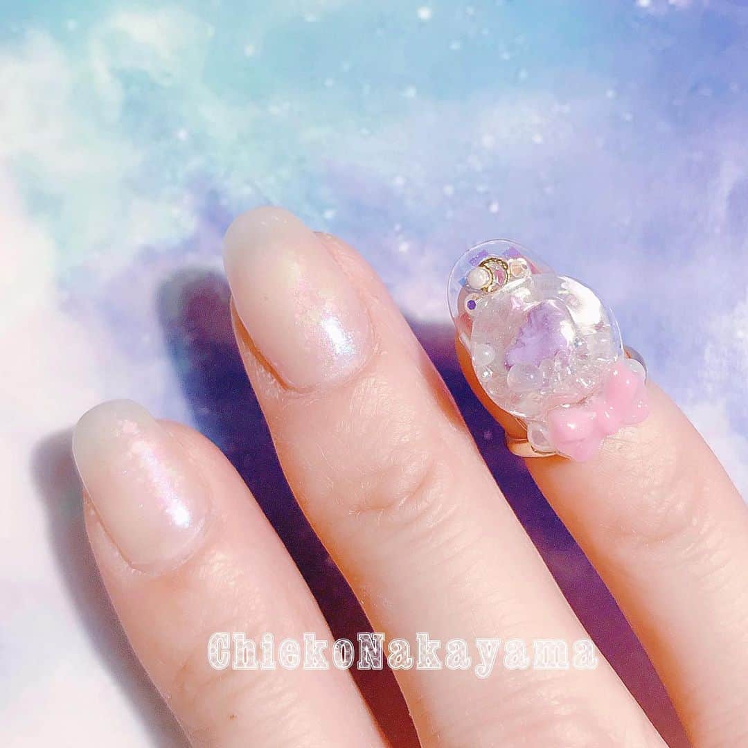 なかやまちえこのインスタグラム：「@stampnailring なかやまちえこ #ハンドメイド ネイルリング 💍⠀⠀ ドームに入ったユニコーンの再販になります✨この後しばらくこちらのデザインは作らない予定なので、気になる方はこの機会によろしくお願い致します😌🙏🙏✨⠀ 数に限りがありますのと、1点1点手作りの為同じお色の組み合わせのデザインはありません☺️💕 ⠀ ご購入は @stampnailring  のプロフィールから販売サイトに飛んでいただくか、ストーリーから飛べます☺️☺️☺️⠀ ⠀ #リングネイル は指先に #リング をはめていただくのみの取り外し簡単に爪先のオシャレを楽しめる商品です✨⠀ #スタンピングネイルリング のアカウントのストーリーハイライトのところからショッピングサイトに飛べます！⠀ 全て一点のみのお造りとなりますので、よろしくお願い致します😌🙏🙏✨⠀ #nail #nails #nailart #ネイル #美甲 #ネイルアート  #japanesenailart #manucure #japanesenails #manicurist #gelnails #أظافر #네일아트 #vẽmóng #ngườiđẹp  #เพ้นท์เล็บ #искусствоногтя #artedeuñas #เพ้นท์เล็บเจล #ジェルネイルデザイン #ネイルデザイン #senikuku #nagelkunst #ゆめかわネイル #オーロラネイル #ゆめかわいい ⠀ ・意匠登録済（デザイン特許）STAMPNAIL ・実用新案登録済（使い方特許）STAMPNAIL」