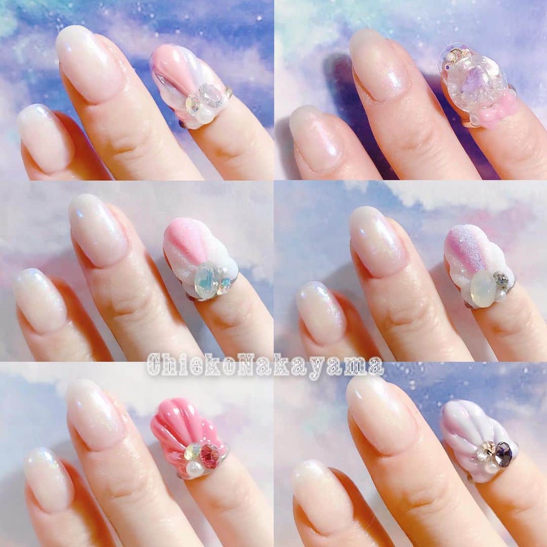 なかやまちえこのインスタグラム：「@stampnailring なかやまちえこ #ハンドメイド ネイルリング 💍⠀⠀ リクエスト頂いておりました#シェルネイル と、ドームに入ったユニコーンの再販になります✨この後しばらくこちらのデザインは作らない予定なので、気になる方はこの機会によろしくお願い致します😌🙏🙏✨⠀ 数に限りがありますのと、1点1点手作りの為同じお色の組み合わせのデザインはありません☺️💕 ⠀ ご購入は @stampnailring  のプロフィールから販売サイトに飛んでいただくか、ストーリーから飛べます☺️☺️☺️⠀ ⠀ #リングネイル は指先にリングをはめていただくのみの取り外し簡単に爪先のオシャレを楽しめる商品です✨⠀ #スタンピングネイルリング のアカウントのストーリーハイライトのところからショッピングサイトに飛べます！⠀ 全て一点のみのお造りとなりますので、よろしくお願い致します😌🙏🙏✨⠀ #nail #nails #nailart #ネイル #美甲 #ネイルアート  #japanesenailart #manucure #japanesenails #manicurist #gelnails #أظافر #네일아트 #vẽmóng #ngườiđẹp  #เพ้นท์เล็บ #искусствоногтя #artedeuñas #เพ้นท์เล็บเจล #ジェルネイルデザイン #ネイルデザイン #senikuku #nagelkunst #ゆめかわネイル #オーロラネイル #ゆめかわいい ⠀ ・意匠登録済（デザイン特許）STAMPNAIL ・実用新案登録済（使い方特許）STAMPNAIL」