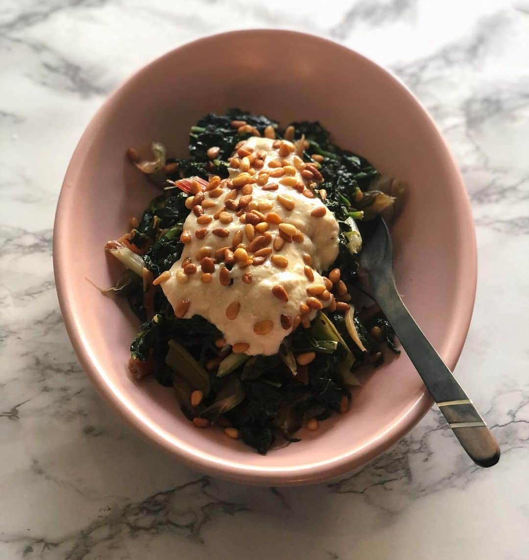 Antonietteのインスタグラム：「I thought today was #meatlessmonday but today is Tuesday. I clearly have lost all concept of time! Well maybe it’s Tahini Tuesday which is fitting for this @ottolenghi recipe from his cookbook, “Jerusalem”. Swiss chard with tahini, yogurt and buttered pine nuts. Thanks @littlemisscontrary for the bounty from your garden. 😊 The fresh greens were punctuated with this vibrant sauce. So good! 😋 Prep shown in my highlights. #quarantinecooking」