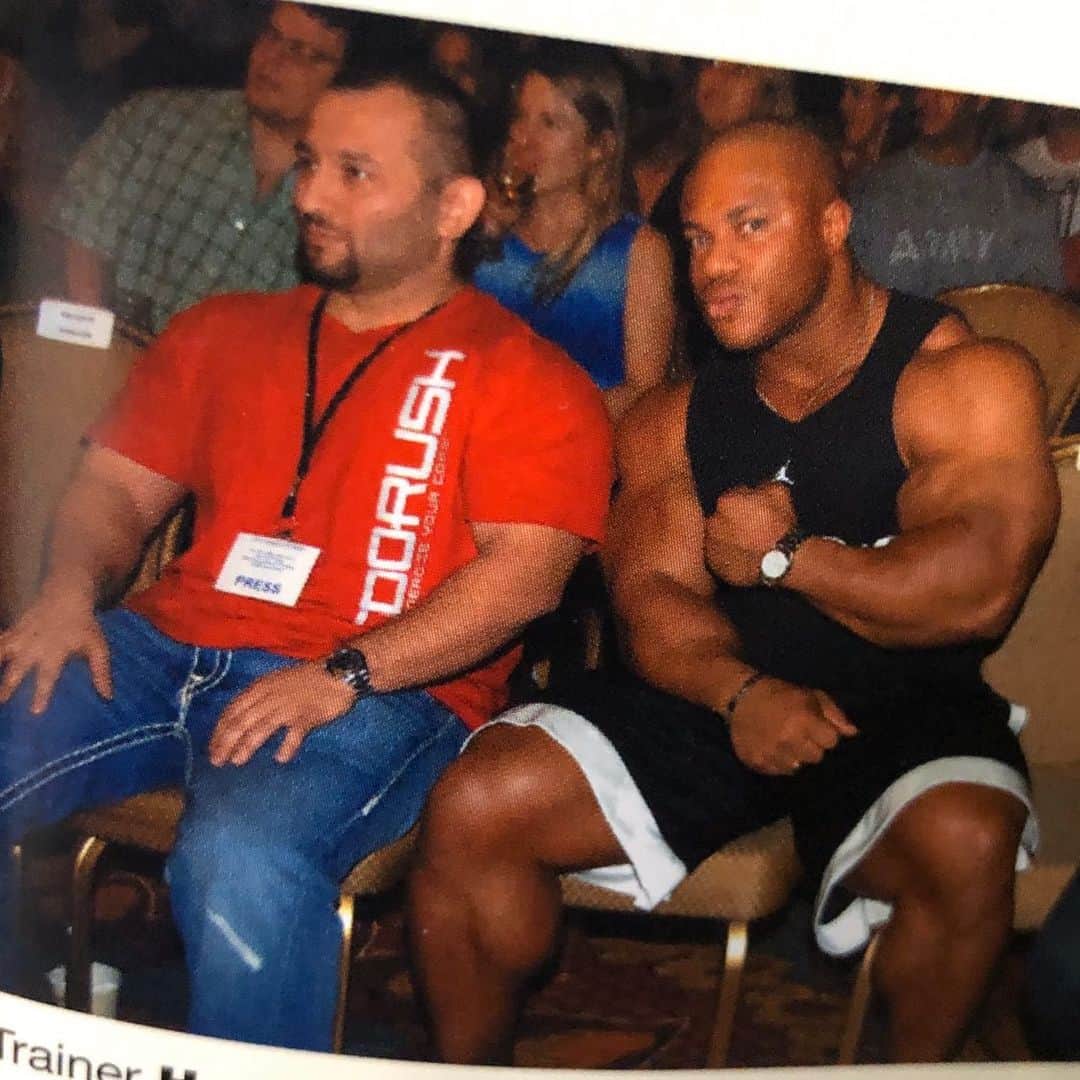 Phil Heathのインスタグラム：「Young Guns!!!! I’m approaching 15 years of knowing and working with @hanyrambod and I must say we have both worked extremely hard. So hard that Hany lost his hair and I’ve grown a damn beard with grey all in it 😂🤣😂. I’ll challenge anyone to guess the year of this #throwback pic. Anyway, just wanted to share a timeless image of the greatest trainer of all damn time (19 Olympia wins) and a young, green eyed brotha with actual calves (yes look at them dammit) who at the time was just embracing what the future of becoming a Mr Olympia could hold. Hany, I think we gonna have to do that IG Live soon and share some stories and maybe some home workout footage, oh and a nice Cheat meal with possibly an adult beverage what’d ya say?! Have a great day everyone and like the late Tupac said, “Through all the rain and the pain, You gotta keep your sense of humor. You gotta be able to smile through all this bullshit!” Love to ALL!!!!!!! #PhilHeath #HanyRambod #SandowCollectors #Tbt #BackWhenIWoreJordans247  #BlueSteelPose #WhyAmISoTanTho 😂🤣😂 #QuarantineAndPhil  #WashYoDamnHands #BeHealthy #BeHappy #EverythingGonnaWorkOut」