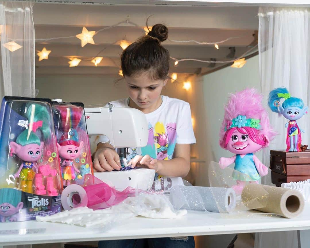 Angie Keiserのインスタグラム：「#ad I don’t know about you guys, but we’re currently welcoming ALL the sparkle and happiness we can find these days. And homeschool Home Ec looks a lot like sewing glittery new outfits for Poppy and the gang, because DreamWorks Trolls World Tour debuts at home on demand April 10. And since our real world travel ambitions may be on hold for a while, venturing to the lands of Funk, Pop, Techno and Rock sound like a welcome reprieve. You can watch #TrollsWorldTour at home and play with the new @Trolls products available online at Walmart.com/Trolls. And if a hip-hop troll made entirely of glitter doesn’t make you smile, well then, fine. How about two? #TrollsFindYourBeat #DreamWorksTrolls @walmart」