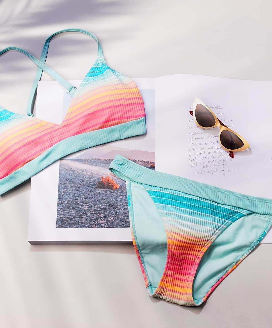 アクセサライズのインスタグラム：「Striped with sorbet colours, our Surf bikini (🔎: 7970399906, 7970409906) sets the tone for a stylish holiday. Pair with our new gold-toned sunglasses (🔎: 7930218100) for poolside perfection. Plus enjoy 20% OFF beach NOW. *Online exclusive. Full price items only. Tap the link in our bio to shop. #Accessorize」