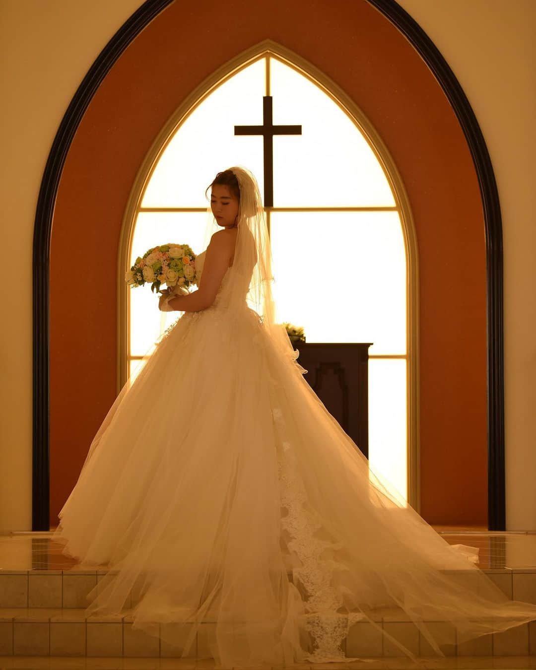 アニエス・ガーデン名張さんのインスタグラム写真 - (アニエス・ガーデン名張Instagram)「． ． @agnesgarden_nabari ． 【#結婚式前撮り 】 ． ． #ウェディングドレス での撮影です📷✨ こちらは#アニエスチャペル にて🥰 暖かい光が幻想的です✨ ドレスのトレーンは長め👗 細かい刺繍も見えるようバックスタイルも綺麗に映します📷 ． ． *☼*―――――*☼*――――― ． ． ＊おすすめフェア＊ ． 8月31日 10時から 【挙式プレゼント中】 総額3万3千円フルコース試食×会場コーディネート見学×相談会 ． その他ブライダルフェア開催しております✨ お問い合わせ＆ご予約受け付けております🙌 ． ． *☼*―――――*☼*――――― ． 素敵な写真がたくさん！ 【#アニエスガーデン名張】 ぜひご覧ください⋆°｡✩ ． *☼*―――――*☼*――――― ． #アニエス #アニエスガーデン #三重県花嫁 #三重花嫁 #結婚式場 #結婚式 #ウエディング #wedding #ブライダル #bridal #プレ花嫁 #プレ花嫁さんと繋がりたい #卒花嫁 #卒花嫁レポ #ウエディングフォト #新郎新婦 #ブライダルフォト #花嫁 #marry花嫁 #チャペル #チャペル挙式  #前撮り #前撮りポーズ  #前撮り写真 ． ． Tel:0800-123-0214(フリーコール)  0595-62-0214 営業時間:平日11:00~18:00  土日祝10:00~19:00 定休日:毎週水曜・第2,4火曜」8月7日 10時54分 - agnesgarden_nabari