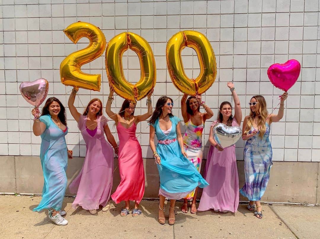 ダニジョーのインスタグラム：「LET’S PARTY 🎉 200k followers on Instagram!!!! Here’s a special THANK YOU from #TeamDannijo (Some key members of the team are missing in this picture but are celebrating from wherever they are! 🥰) We absolutely adore the community we’ve built and love watching it grow. Here’s to all of you for coming along for the ride 🌈 We can’t forget to shoutout our other half, @danielleasnyder, who’s dancing up the hilly streets of San Francisco, celebrating! Also, a shoutout to our #DannijoDude, Juan, who took this picture...He wasn’t too thrilled about wearing a chiffon dress 😂 Once again, thank you to all of our loyal customers and followers for the continuous support ❤️ Cheers! 🥂」