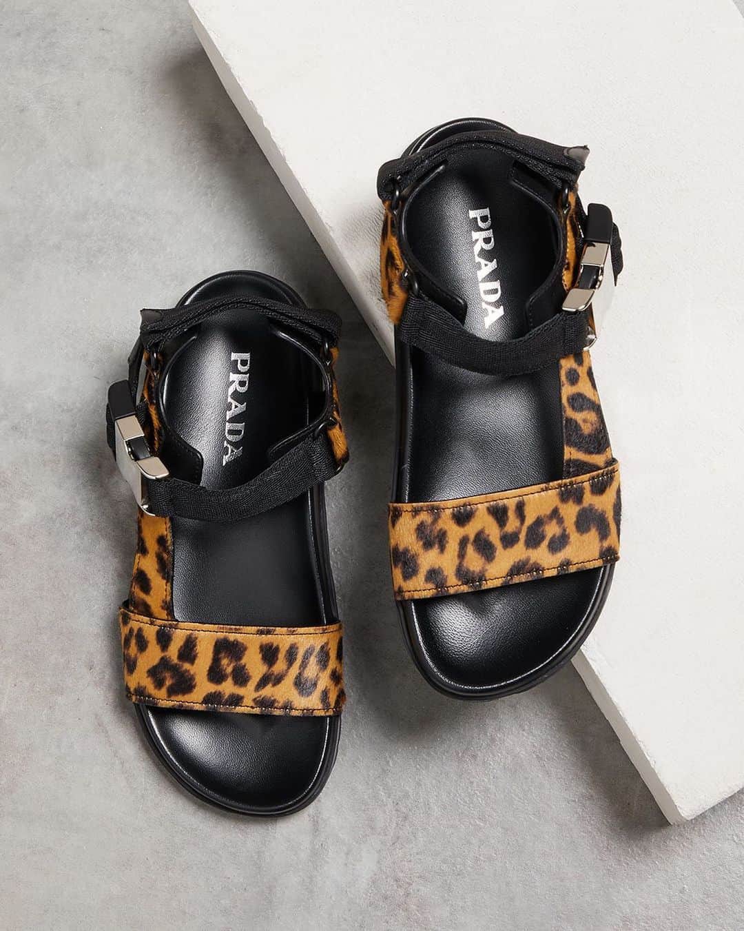 MATCHESFASHION.COMさんのインスタグラム写真 - (MATCHESFASHION.COMInstagram)「Statement sandals come courtesy of @prada this season. Tap to shop and hit the link in bio for more shoes from the label.」8月8日 1時46分 - matches