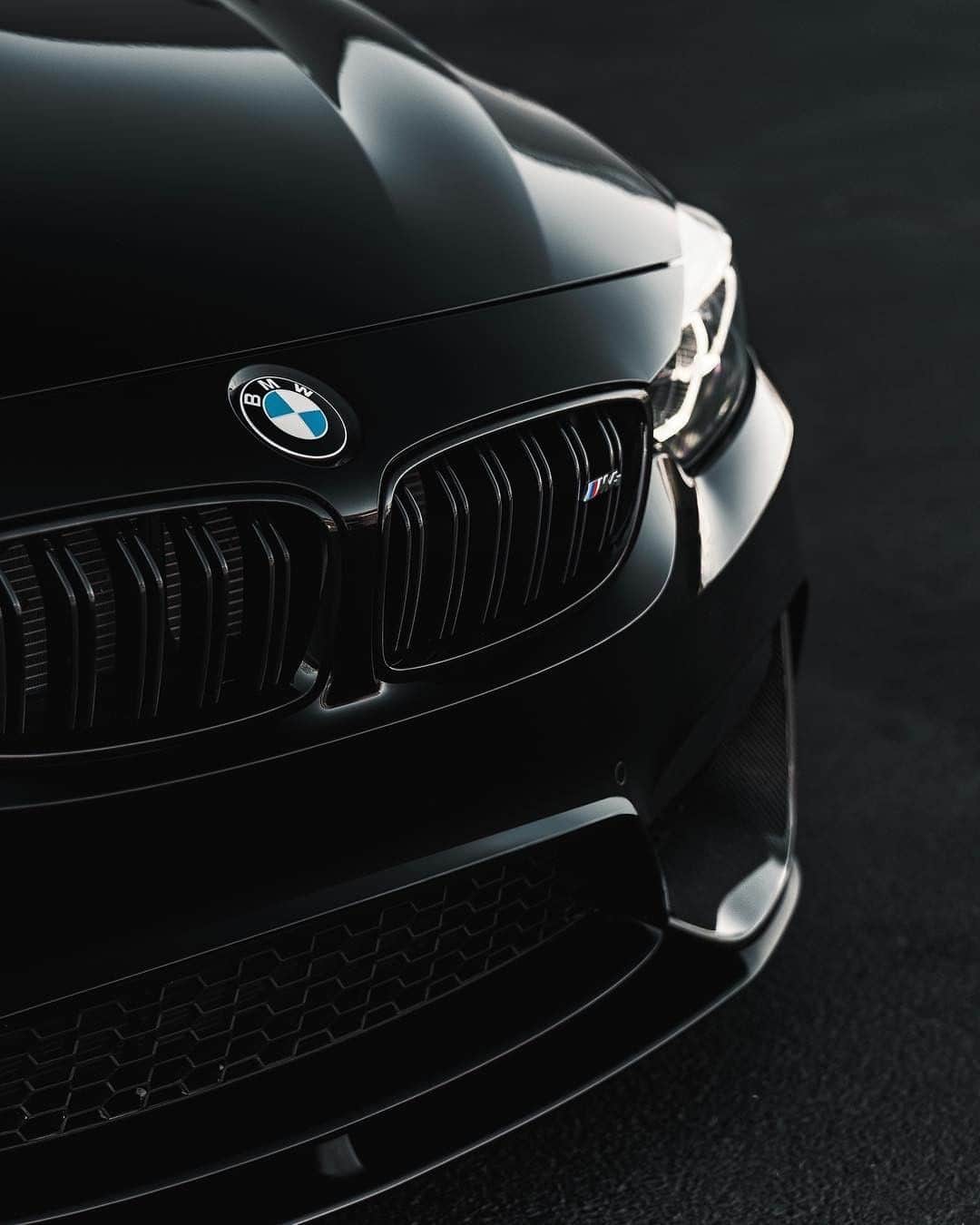 BMWのインスタグラム：「Power is the new black. The BMW M4 Coupé. #TheM4 #BMW #M4 #BMWM #BMWrepost @shadow_m4 __ BMW M4 Coupé: Fuel consumption in l/100 km (combined): 10.0 (9.3). CO2 emissions in g/km (combined): 227 (213). Acceleration (0-100 km/h): 4.3 s. Power: 431 hp, 550 Nm. Top speed (limited): 250 km/h.  The figures in brackets refer to the vehicle with seven-speed M double-clutch transmission with Drivelogic. The values of fuel consumptions, CO2 emissions and energy consumptions shown were determined according to the European Regulation (EC) 715/2007 in the version applicable at the time of type approval. The figures refer to a vehicle with basic configuration in Germany and the range shown considers optional equipment and the different size of wheels and tires available on the selected model. The values of the vehicles are already based on the new WLTP regulation and are translated back into NEDC-equivalent values in order to ensure the comparison between the vehicles. [With respect to these vehicles, for vehicle related taxes or other duties based (at least inter alia) on CO2-emissions the CO2 values may differ to the values stated here.] The CO2 efficiency specifications are determined according to Directive 1999/94/EC and the European Regulation in its current version applicable. The values shown are based on the fuel consumption, CO2 values and energy consumptions according to the NEDC cycle for the classification. For further information about the official fuel consumption and the specific CO2 emission of new passenger cars can be taken out of the „handbook of fuel consumption, the CO2 emission and power consumption of new passenger cars“, which is available at all selling points and at https://www.dat.de/angebote/verlagsprodukte/leitfaden-kraftstoffverbrauch.html.」