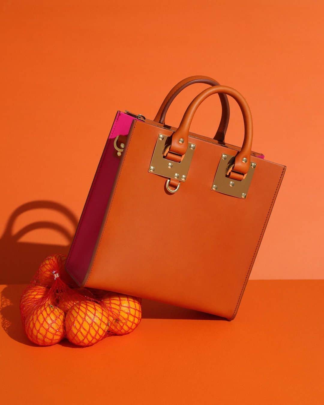 Sophie Hulmeのインスタグラム：「Tangy. Shop bright hues online... 🍊 🍋 🍎」