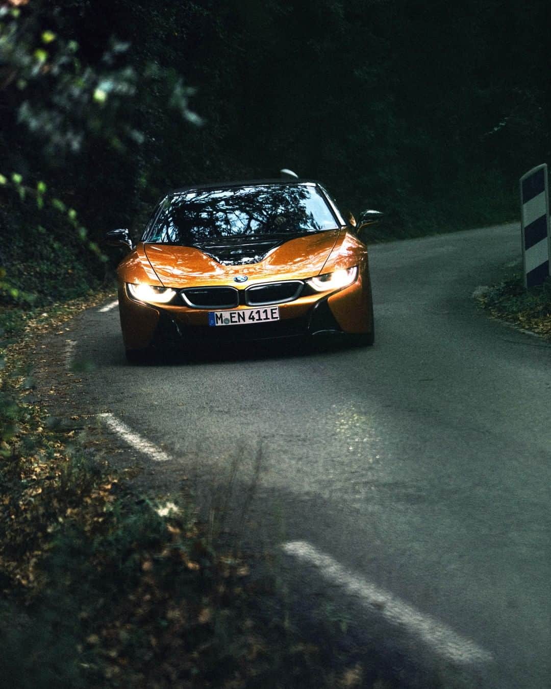 BMWのインスタグラム：「Up to non-stop challenges. The BMW i8 Coupé. #THEi8 #BMW #BMWi8 #BMWi @BMWi __ BMW i8 Coupé: Energy consumption in kWh/100 km (combined): 14.0. Fuel consumption in l/100 km (combined): 1.8. CO2 emissions in g/km (combined): 42.  Acceleration (0-100 km/h): 4.4 s. Power: 374 hp, 320 Nm. Top speed (limited): 250 km/h. Paint finish shown: E-Copper metallic.  The values of fuel consumptions, CO2 emissions and energy consumptions shown were determined according to the European Regulation (EC) 715/2007 in the version applicable at the time of type approval. The figures refer to a vehicle with basic configuration in Germany and the range shown considers optional equipment and the different size of wheels and tires available on the selected model. The values of the vehicles are already based on the new WLTP regulation and are translated back into NEDC-equivalent values in order to ensure the comparison between the vehicles. [With respect to these vehicles, for vehicle related taxes or other duties based (at least inter alia) on CO2-emissions the CO2 values may differ to the values stated here.] The CO2 efficiency specifications are determined according to Directive 1999/94/EC and the European Regulation in its current version applicable. The values shown are based on the fuel consumption, CO2 values and energy consumptions according to the NEDC cycle for the classification. For further information about the official fuel consumption and the specific CO2 emission of new passenger cars can be taken out of the „handbook of fuel consumption, the CO2 emission and power consumption of new passenger cars“, which is available at all selling points and at https://www.dat.de/angebote/verlagsprodukte/leitfaden-kraftstoffverbrauch.html.」