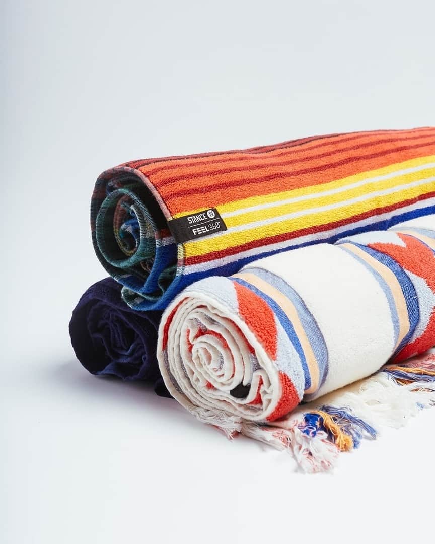 のインスタグラム：「Our Largest Canvas Yet…⛱️ Introducing Stance Beach Blankets - the perfect accessory to a hot Summer day on the sand. ☀️ Each blanket is treated with #FEEL360 technology, which eliminates odor-causing bacteria for the freshest experience. Designs reference patterns and color palettes used across our existing collections. Three Beach Blanket styles are available now - link in bio.」