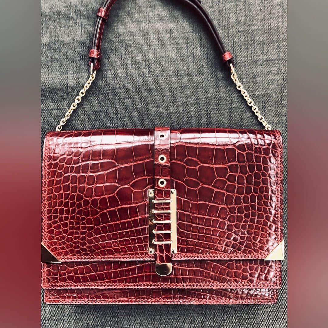 のインスタグラム：「She’s exotic by nature.... My MERCER handbag/clutch in wine colored Porosus Crocodile.... She’s a beauty  For more information email:  Clientservices@brianatwood.com #handbag #crocodile #luxury #madeinitaly #fashion #sickbags #brianatwood」