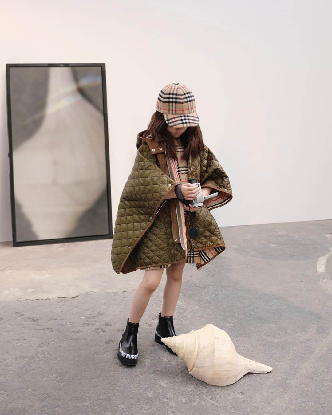 Burberryさんのインスタグラム写真 - (BurberryInstagram)「In miniature: Checks and stripes . A new wardrobe for #Burberry girls, our vintage check baseball cap meets the quilted khaki cape, lined with our signature icon stripe . #BurberryGeneration」8月9日 22時06分 - burberry