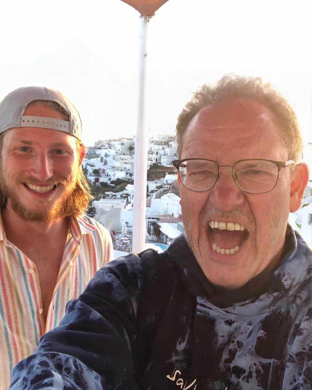 ティモシー・サイクスのインスタグラム：「Time flies when I’m having too much fun in Greece with my student @mikehuddie who just graduated college and has now made roughly $250,000 in the stock market so far...and more importantly is learning to take #laptoplifestyle photos just like me :) #ilovemyjob #workfromanywhere #faceappchallenge #theoldjewish」