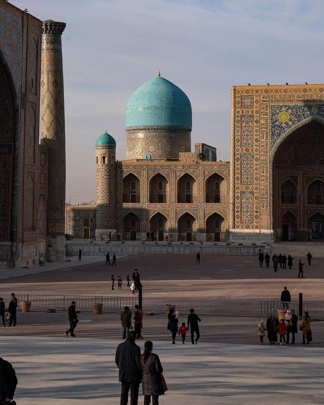 National Geographic Travelさんのインスタグラム写真 - (National Geographic TravelInstagram)「Photo by @andy_mann // sponsored by @parkhyatt // The Registan, a square dating back to the early 1400s, was the heart of the ancient city of Samarkand, now part of Uzbekistan. People gathered in the square to hear royal proclamations, trade goods traveling along the Silk Road, and witness public executions. What we see today is the tireless work of hundreds of people who have restored this unique and historic monument over many decades. Thousands of visitors flow through the square each day, admiring the afternoon glow that bathes the turquoise domes and stone pillars. // For discerning @parkhyatt guests, luxury is not easily defined but often reflected in their most personal travel mementos. #ParkHyatt #LuxuryIsPersonal」7月18日 1時11分 - natgeotravel