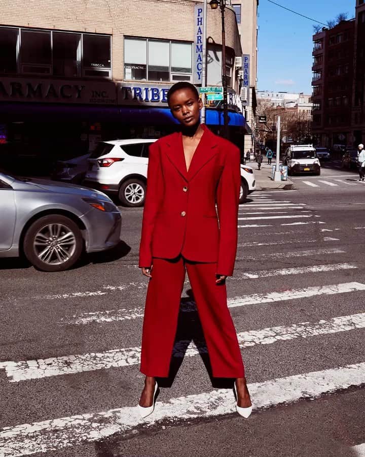 Saks Fifth Avenueのインスタグラム：「#SaksIRL: Model @flavianamatata takes a power stance in head-to-toe fire-engine red from @khaite_ny.  Pictured: @flavianamatata  Look: @khaite_ny  Photographer: @braydyolson  Makeup: @makeupmark  Hair: @charlesmchair」