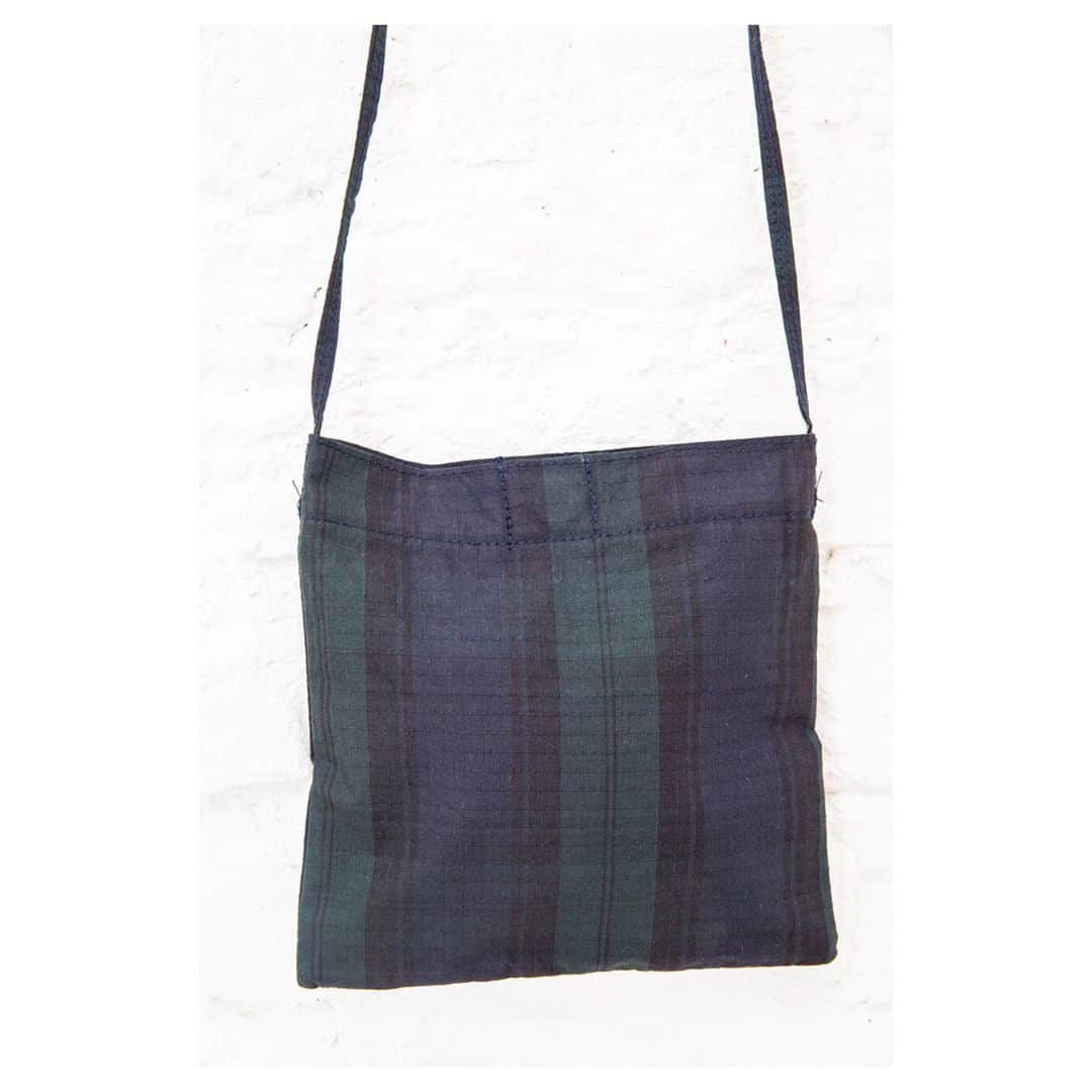 キャベジズ&ローゼズのインスタグラム：「Double the tartan, Double the fun 🖤💚🖤 The Rome Bag in blackwatch tartan makes an excellent companion for the Desdimona Dress. Both are made in limited numbers in London out of a special textured Japanese fabric 👇Tap to shop one of our favourite looks of the season👇#newbag #tartan #tartanbag #crossbodybags #sustainablebags #tartandress #japanesefabric #consciousfashion #cabbagesandroses #cabbagesandrosesfashion @christina_strutt @cabbagesandroses_shop」