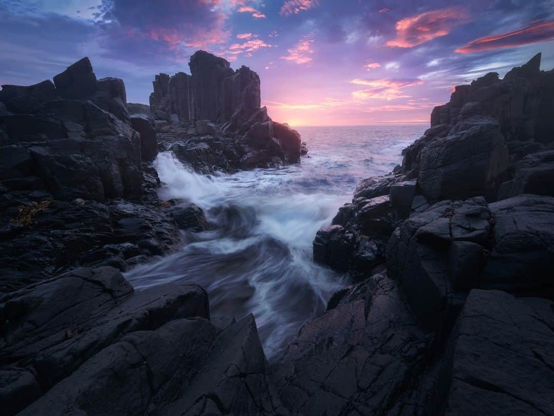 Nikon Australiaさんのインスタグラム写真 - (Nikon AustraliaInstagram)「"Bombo Quarry is an extremely popular spot amongst NSW seascape photographers, and it's easy to see why. On this particular morning, the rising sun caused the horizon to glow a scarlet red and illuminated the clouds above with a stellar glow, as waves surged in and out of the rocky channel." - @benmazephoto  Camera: Nikon #D750 Lens: AF-S NIKKOR 16-35mm f/4G ED VR Settings: 16mm | 0.3s | f/8 | ISO 200  #MyNikonLife #Nikon #NikonAustralia #NikonTop #Photography #DSLR #Nikkor #MyNikkor #NikonPhotography #LandscapePhotography #SunrisePhotography #SeascapePhotography #DiscoverNSW」7月18日 15時30分 - nikonaustralia
