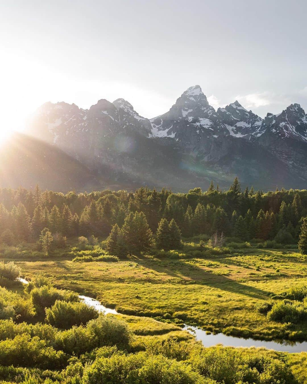 National Geographic Travelさんのインスタグラム写真 - (National Geographic TravelInstagram)「Photo by @taylorglenn | Last light at Blacktail Ponds Overlook as an evening storm clears in Grand Teton National Park. There is something so incredibly magical about the quality of light that occurs just as the sun is about to set behind the mountain range. The shadows of the peaks and the glow of the low angled sunlight creates the most beautiful depth and glow across the landscape. It's the kind of light we photographers dream about. To see more of this incredible #Wyoming landscape follow @taylorglenn #grandtetonnationalpark #jacksonhole」7月19日 4時09分 - natgeotravel