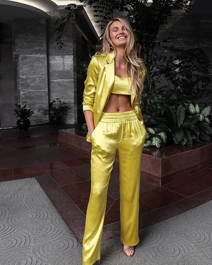 Saks Fifth Avenueのインスタグラム：「#SaksIRL: Model @romeestrijd heads out to happy hour in a neon satin set by @cinqasept. #Regram」