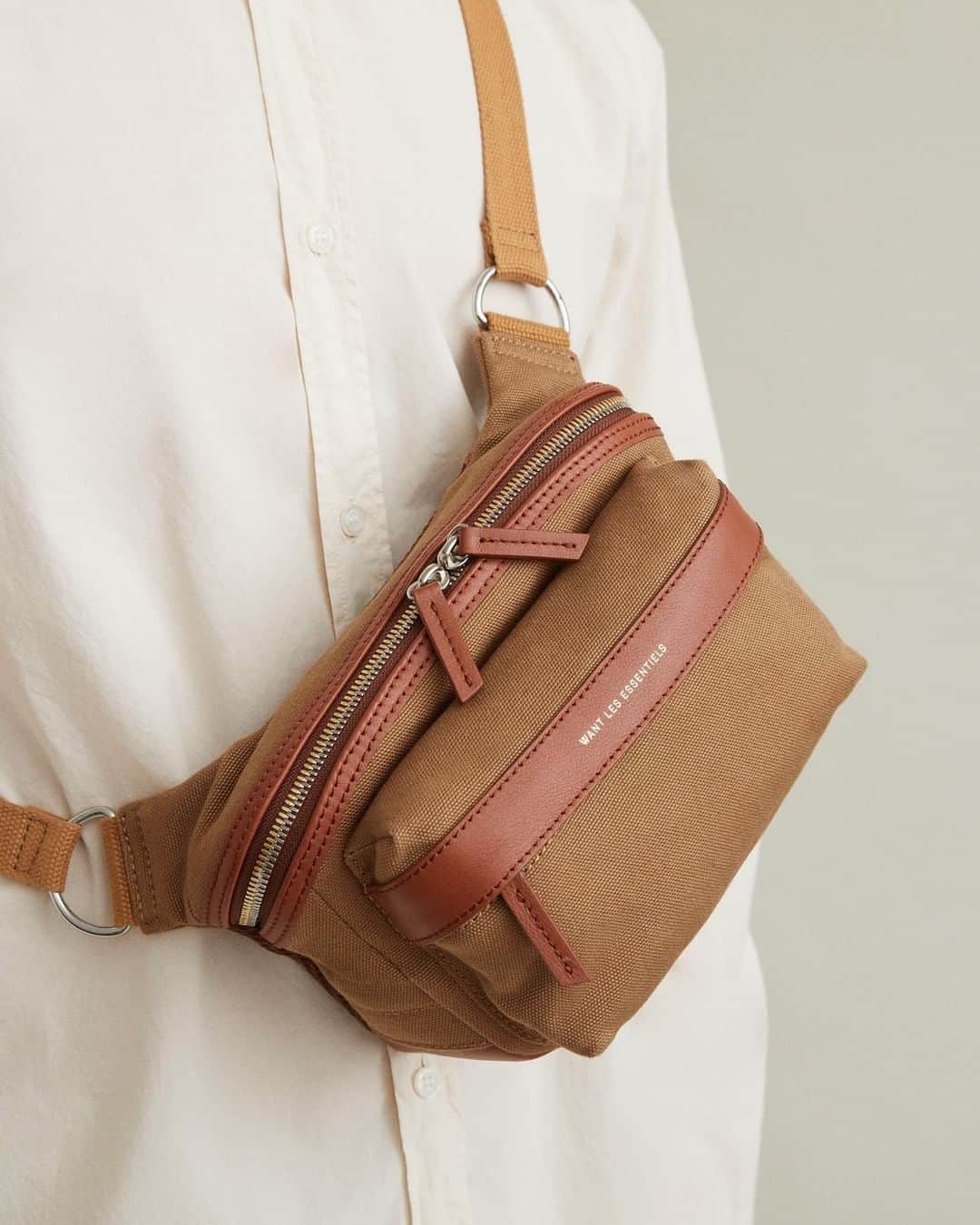 ウォントのインスタグラム：「Our Tacoma blends raw materials with sophisticated form for a refined take on practicality and style this summer. Shop the unisex waist pack in sustainable fabrics on WANTLesEssentiels.com. — #wantlesessentiels #accessories #waistpack #design #essentials」