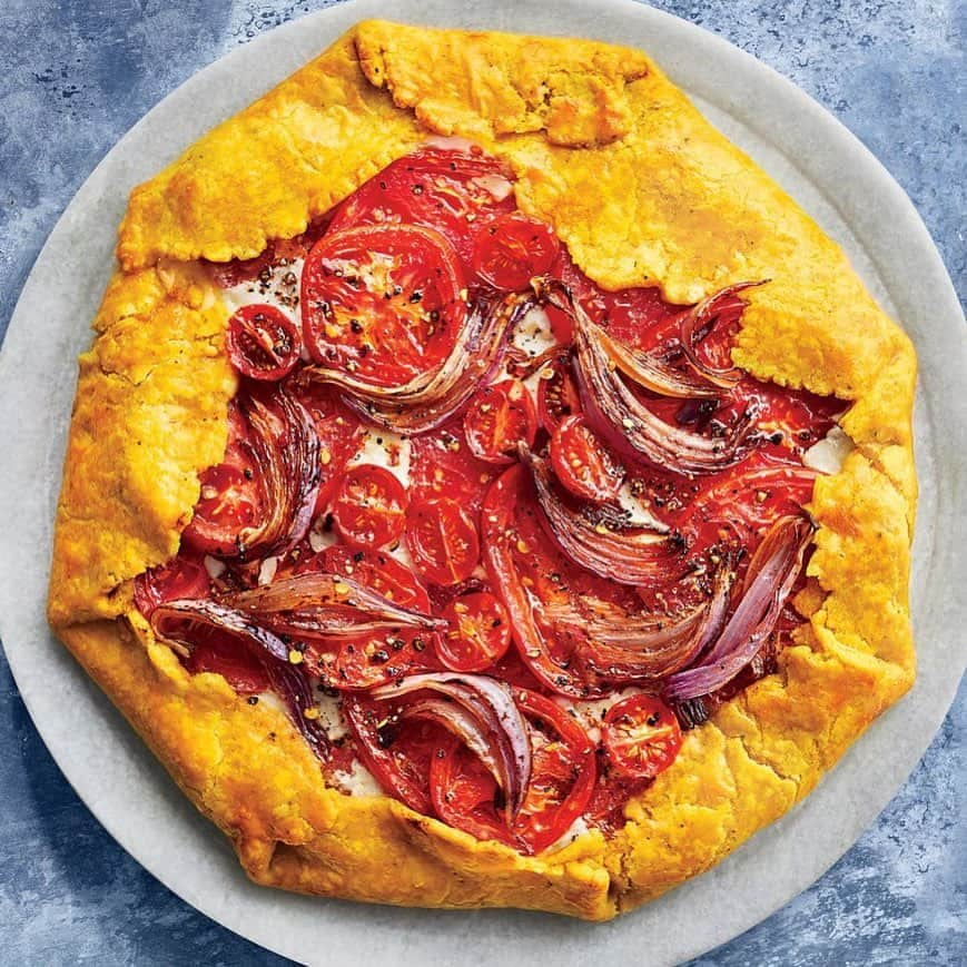 Food & Wineさんのインスタグラム写真 - (Food & WineInstagram)「Turmeric gives the crust of this tomato pie—our August cover star—a glorious golden glow, but the real star (other than the ripe summer 🍅) are the sweet and tangy tamarind onions, the perfect compliment to a cheesy filling. Team Food & Wine baked it at home this week; if you #cookthecover after picking up our August issue or checking out the recipe link in our bio, tag us @foodandwine—we'd love to see! 📷: @gregdupree」7月19日 22時49分 - foodandwine