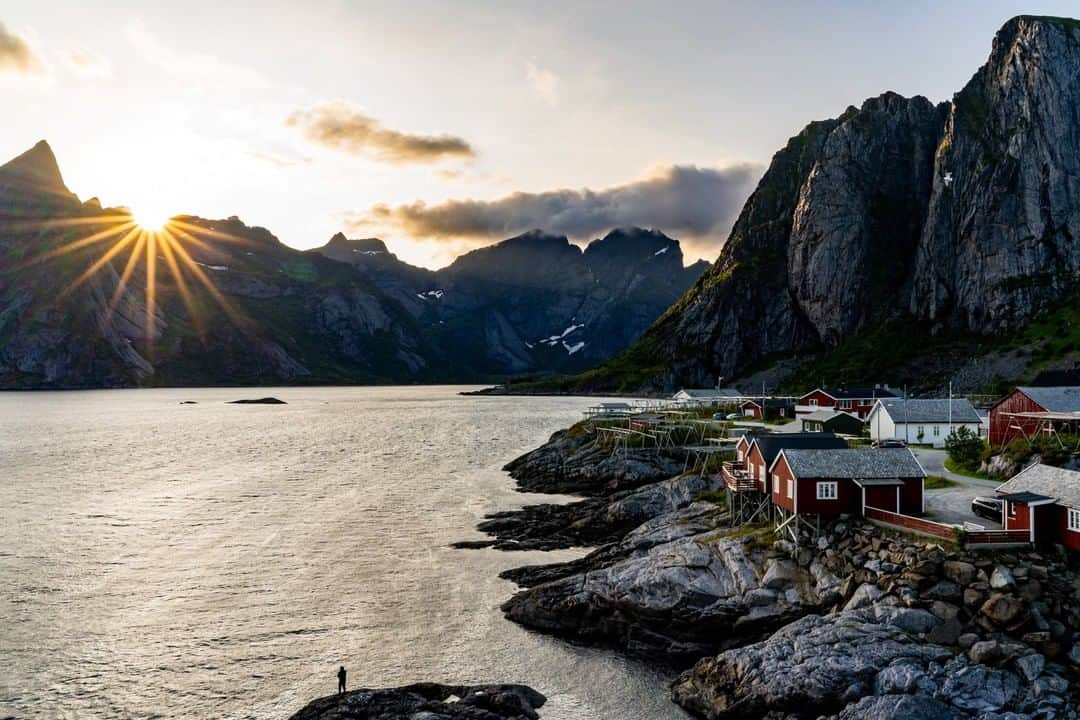 National Geographic Travelさんのインスタグラム写真 - (National Geographic TravelInstagram)「Photo by @ErikaSkogg | The Lofoton Archipelago rises out of the Norwegian sea with traditional red Rorbuer (fishing huts) clasping to rocky coastline. While the reminders of a still active cod fishery abound in cuisine and in harbor activity, many of the original fishing huts have been converted into idyllic guest houses for travelers to enjoy the views of surrounding mountains and the midnight summer sun above the arctic circle.」7月21日 10時02分 - natgeotravel