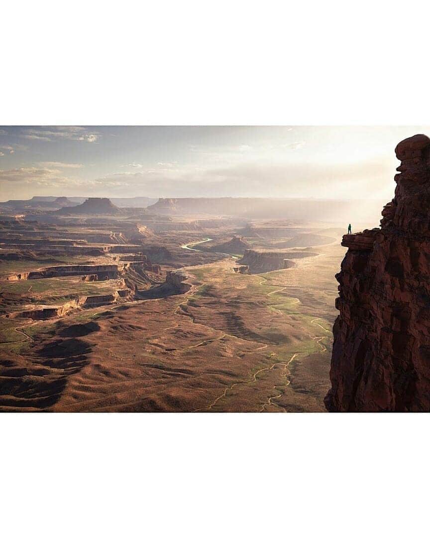 Discover Earthさんのインスタグラム写真 - (Discover EarthInstagram)「"By far, one of my favorite evenings of photography in a very, very, long time. It all took place in a magical area of Utah. I will not disclose this location however, due to the nature of this photograph in which Abby is depicted near the edge of a very large drop off. I don’t need to be responsible for encouraging others to copy this shot! Now while this may look insanely dangerous (which it can be whenever you’re near any drop off), @abbygomer was much further from the actual edge than it appears. The shelf she is standing on wraps behind the edge with plenty of walking space and a nice little trail to get there. It’s all about perspective. . Ok, back to the experience of this evening and what made it so amazing. First off, the views are “holy freaking cow!” The weather was beautifully warm and the sunlight was scrumpshish. Also, this composition worked out to be an absolute stunner, so there was that added element of “I can’t believe I’m capturing this right now!” going through my head. I may have even said this at least 20 times out loud. After photographing this spot around the start of golden hour, we saw another composition a few hundred yards further down the canyon rim that caught our eyes. - Therefore, we decided to scout for a nice sunset composition to wrap up the evening. Little did we know, we were in for one heck of a light and color show. Take in the views from the photo above, and admire how stunningly epic Abby looks standing on top of the world." 🇺🇸 — 📍#DiscoverUtah — 📸 Caption & photo by @benstraussphotography」7月22日 1時58分 - discoverearth