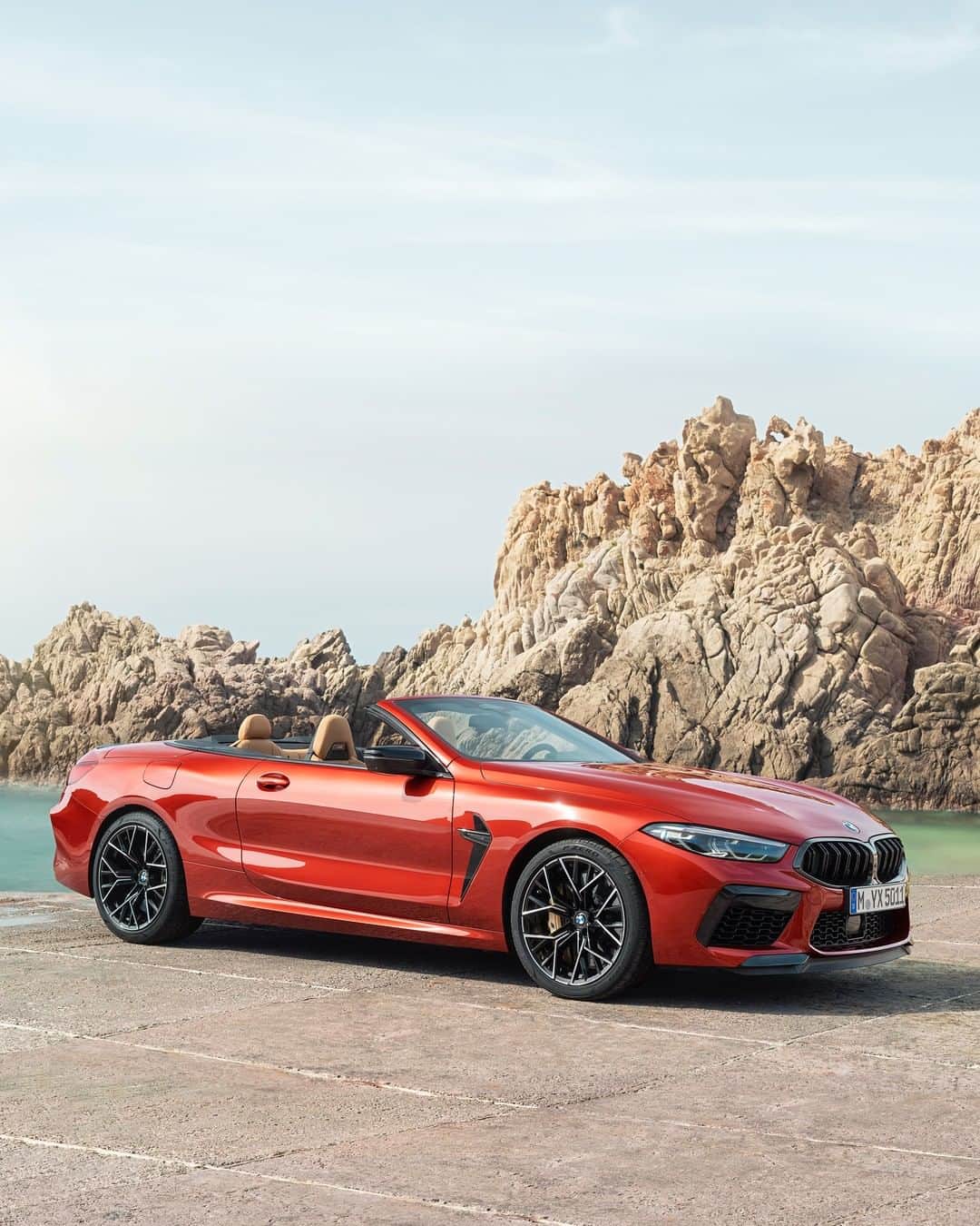 BMWのインスタグラム：「Elegant vibe of summer. The first-ever BMW M8 Competition Convertible. #TheM8 #BMW #M8 #BMWM __ BMW M8 Competition Convertible: Fuel consumption in l/100 km (combined): 10.8 - 10.6. CO2 emissions in g/km (combined): 246 - 241. The values of fuel consumptions, CO2 emissions and energy consumptions shown were determined according to the European Regulation (EC) 715/2007 in the version applicable at the time of type approval. The figures refer to a vehicle with basic configuration in Germany and the range shown considers optional equipment and the different size of wheels and tires available on the selected model. The values of the vehicles are already based on the new WLTP regulation and are translated back into NEDC-equivalent values in order to ensure the comparison between the vehicles. [With respect to these vehicles, for vehicle related taxes or other duties based (at least inter alia) on CO2-emissions the CO2 values may differ to the values stated here.] The CO2 efficiency specifications are determined according to Directive 1999/94/EC and the European Regulation in its current version applicable. The values shown are based on the fuel consumption, CO2 values and energy consumptions according to the NEDC cycle for the classification. For further information about the official fuel consumption and the specific CO2 emission of new passenger cars can be taken out of the „handbook of fuel consumption, the CO2 emission and power consumption of new passenger cars“, which is available at all selling points and at https://www.dat.de/angebote/verlagsprodukte/leitfaden-kraftstoffverbrauch.html.」
