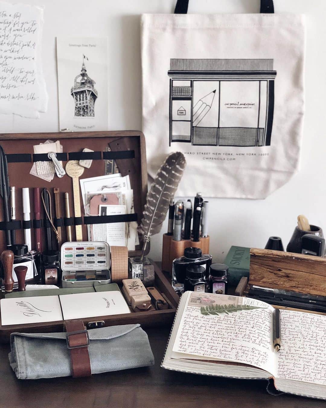 Catharine Mi-Sookさんのインスタグラム写真 - (Catharine Mi-SookInstagram)「“Roads go ever ever on, Under cloud and under star. Yet feet that wandering have gone Turn at last to home afar. Eyes that fire and sword have seen, And horror in the halls of stone Look at last on meadows green, And trees and hills they long have known.” -J.R.R. Tolkien . . . . Brassing Desk Pen @ystudiostyle inked with the stunning new color Blueberry Muffin from @monteverdepens_official Sweet Life inks. Jackson Journal in the Companion size & Mini Sendak in slate waxed canvas @pegandawl. Writing Box & Wooden Pen Holder @galen_leather. . . . . #jrrtolkien #journaling #dailyjournal #ystudio #fountainpens #penmanship #teammonteverde #monteverde #fountainpenink #galenleather #writingbox #loveforanalogue #stationery #stationerylove #pegandawl #creativejournaling #creativejournal #creativespace #desksetup #deskgoals #plannernerd #thedailywriting #abmspaces #scrapbooking #scrapbooklayout #thingsorganizedneatly」7月22日 3時59分 - catharinemisook