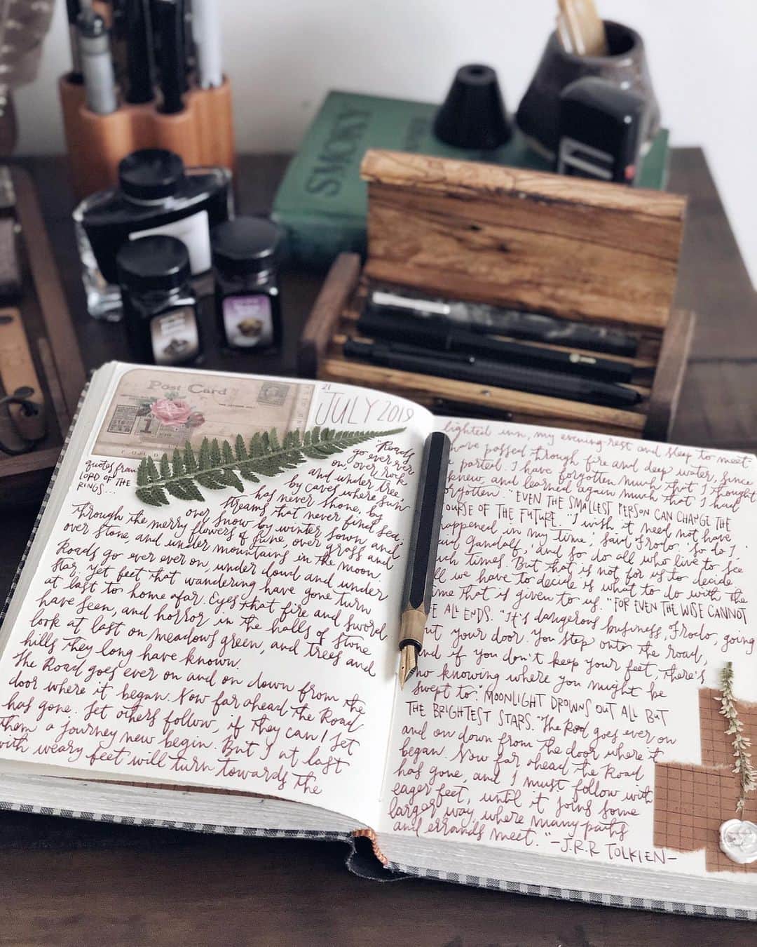 Catharine Mi-Sookさんのインスタグラム写真 - (Catharine Mi-SookInstagram)「“Roads go ever ever on, Under cloud and under star. Yet feet that wandering have gone Turn at last to home afar. Eyes that fire and sword have seen, And horror in the halls of stone Look at last on meadows green, And trees and hills they long have known.” -J.R.R. Tolkien . . . . Brassing Desk Pen @ystudiostyle inked with the stunning new color Blueberry Muffin from @monteverdepens_official Sweet Life inks. Jackson Journal in the Companion size & Mini Sendak in slate waxed canvas @pegandawl. Writing Box & Wooden Pen Holder @galen_leather. . . . . #jrrtolkien #journaling #dailyjournal #ystudio #fountainpens #penmanship #teammonteverde #monteverde #fountainpenink #galenleather #writingbox #loveforanalogue #stationery #stationerylove #pegandawl #creativejournaling #creativejournal #creativespace #desksetup #deskgoals #plannernerd #thedailywriting #abmspaces #scrapbooking #scrapbooklayout #thingsorganizedneatly」7月22日 3時59分 - catharinemisook