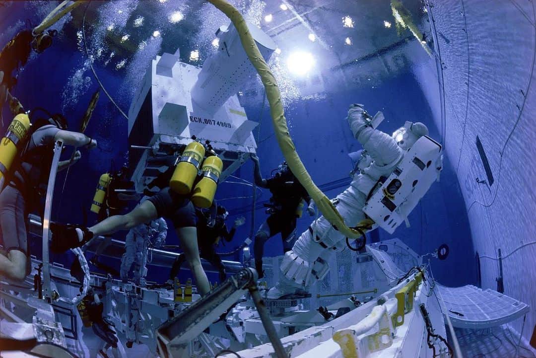 thephotosocietyさんのインスタグラム写真 - (thephotosocietyInstagram)「Photo by @joemcnallyphoto -  Lots of memories of space exploration this week. #50thanniversaryofthemoonlanding-Training to go to the hostile environment of space is rigorous. Here, astronauts train in the Neutral Buoyancy Laboratory, underwater, to achieve effect of weightlessness they experience in space. This giant pool, 200’x40’ by 40’ deep, has trained astronauts preparing for EVA (Extravehicular Activities) such as space walks, Space Shuttle repairs, etc. Lots of permissions, training and preparations went into gaining access to shooting this photo, made for @natgeo, on assignment photographing STS-95, John Glenn’s return to space.」7月22日 9時05分 - thephotosociety