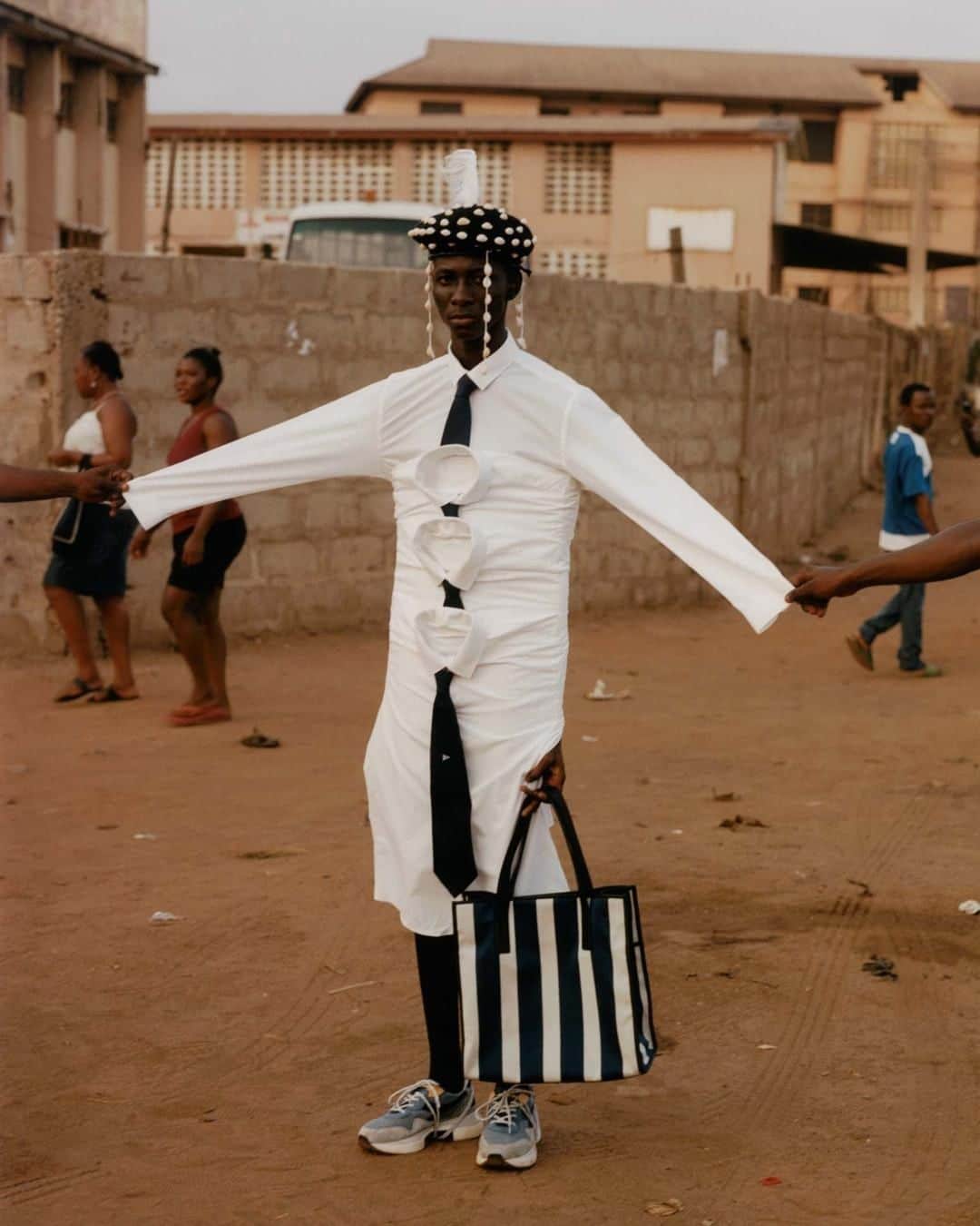 i-Dさんのインスタグラム写真 - (i-DInstagram)「Back to work mood. 😑👔⁣ ⁣ [The Voice of a Generation Issue, no. 356, Summer 2019.]⁣⁣ .⁣⁣ .⁣⁣ .⁣⁣ Photography @_kyleweeks_⁣⁣ Styling @ibkamara⁣⁣ Joel wears shirt, ties and hat #Ibkamarastudios. Bag #Tods. Trainers #Diadora.⁣ #Accra #Ghana #IbKamara #KyleWeeks」7月22日 20時28分 - i_d