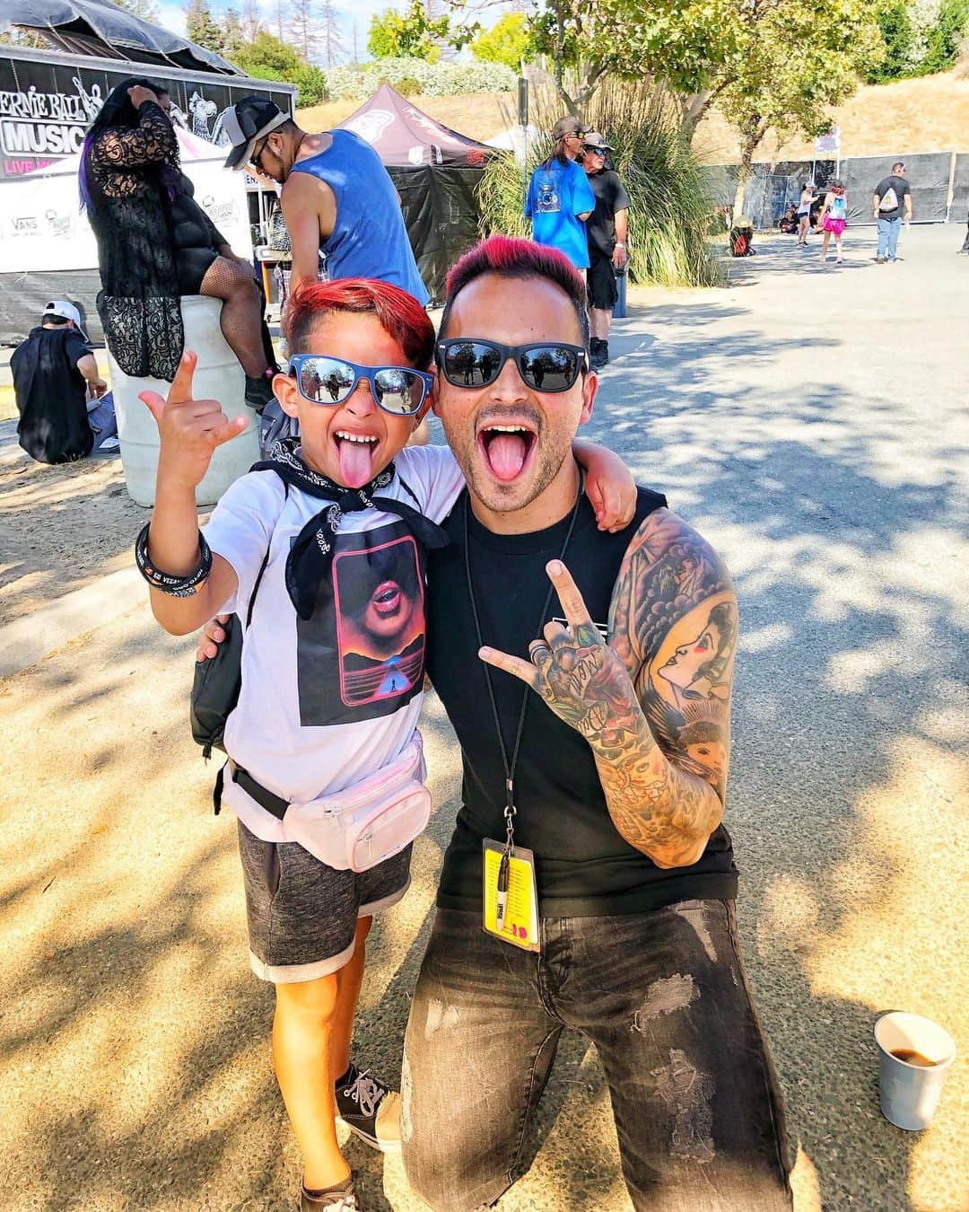ニック・マーティンのインスタグラム：「Well, @vanswarpedtour was insane yesterday! I don’t have photos to show you from our set. But, I do have one photo that ultimately is more suiting to post, at the moment. I met this awesome kid yesterday. He had the biggest smile on his face and was so excited to meet me & get a photo together. Dyed red hair, homemade Sirens shirt, and just ready to have the time of his life. THIS is what it’s all about for me. THIS made the final @vanswarpedtour that much more special for me. I remember how seminal @vanswarpedtour was for me as a kid & just being surrounded by so many types of music, culture, & people — all while having the best time of my life. After I took a photo with him, I asked if he would take a photo with me on my phone. So, this is the one photo I took from @vanswarpedtour yesterday that made my whole day & really sums up what Warped is all about. Thank you @vanswarpedtour @kevinlyman @brixton23 for all the incredible years & for allowing us to be a part of it ✌🏽 Much love ❤️ #warpedtour #vans #vanswarpedtour」