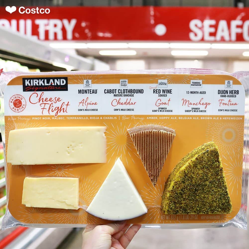 Costcoさんのインスタグラム写真 - (CostcoInstagram)「Grab the 🍷 and crackers! The Kirkland Signature™ Cheese Flight is back with new flavors: Manchego, Dijon Herb Hand-Rubbed Fontina and more. Look for the yellow packaging in the deli.  Please drink responsibly.」7月24日 7時12分 - costco