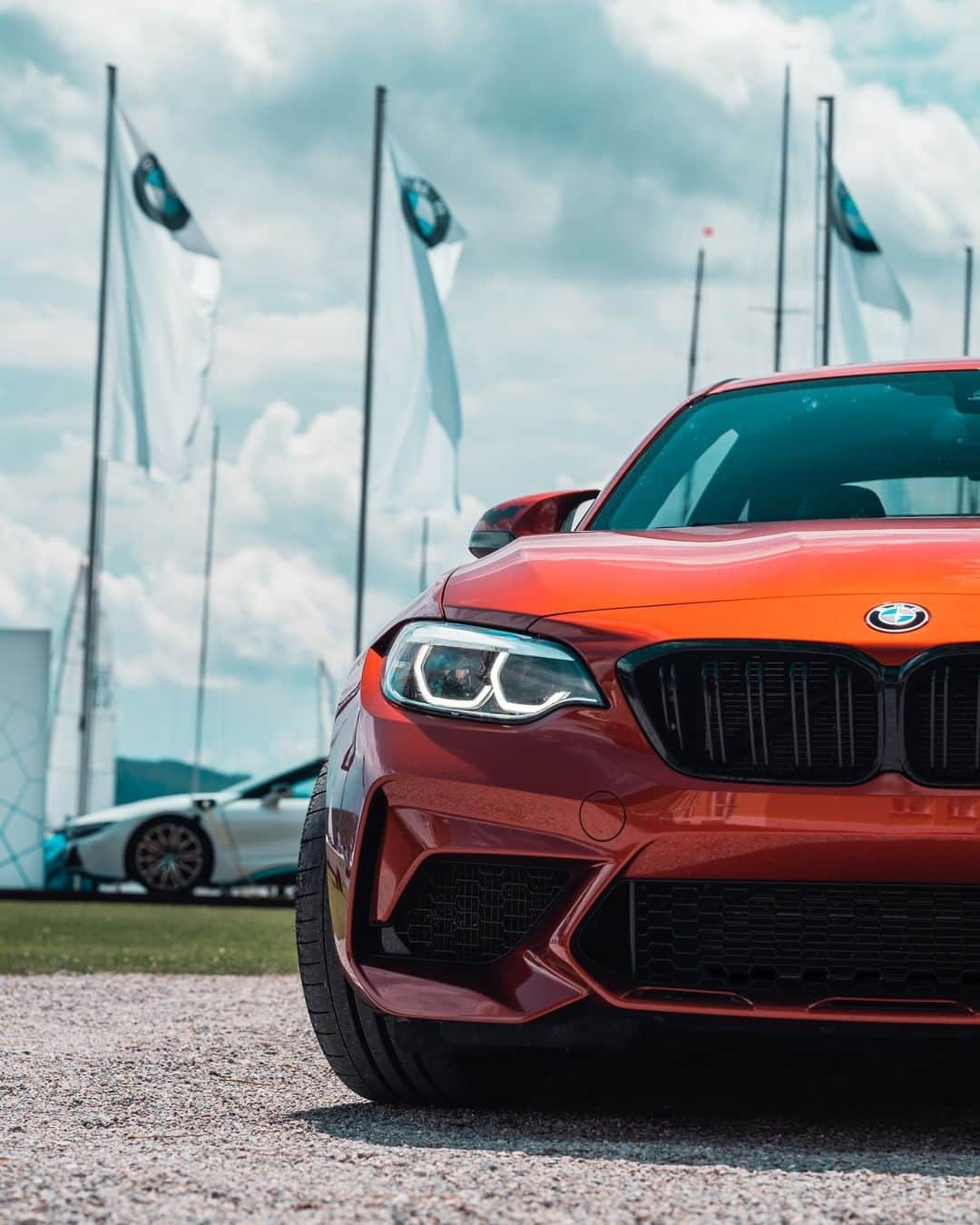 BMWのインスタグラム：「Brilliant combination of design and strength. The BMW M2 Competition. #TheM2 #BMW #M2 #BMWM @bmw_yachtsport __ BMW M2 Competition: Fuel consumption in l/100 km (combined): 10.0 (9.2). CO2 emissions in g/km (combined): 227 (209). The figures in brackets refer to the vehicle with seven-speed M double-clutch transmission with Drivelogic. The values of fuel consumptions, CO2 emissions and energy consumptions shown were determined according to the European Regulation (EC) 715/2007 in the version applicable at the time of type approval. The figures refer to a vehicle with basic configuration in Germany and the range shown considers optional equipment and the different size of wheels and tires available on the selected model. The values of the vehicles are already based on the new WLTP regulation and are translated back into NEDC-equivalent values in order to ensure the comparison between the vehicles. [With respect to these vehicles, for vehicle related taxes or other duties based (at least inter alia) on CO2-emissions the CO2 values may differ to the values stated here.] The CO2 efficiency specifications are determined according to Directive 1999/94/EC and the European Regulation in its current version applicable. The values shown are based on the fuel consumption, CO2 values and energy consumptions according to the NEDC cycle for the classification. For further information about the official fuel consumption and the specific CO2 emission of new passenger cars can be taken out of the „handbook of fuel consumption, the CO2 emission and power consumption of new passenger cars“, which is available at all selling points and at https://www.dat.de/angebote/verlagsprodukte/leitfaden-kraftstoffverbrauch.html.」