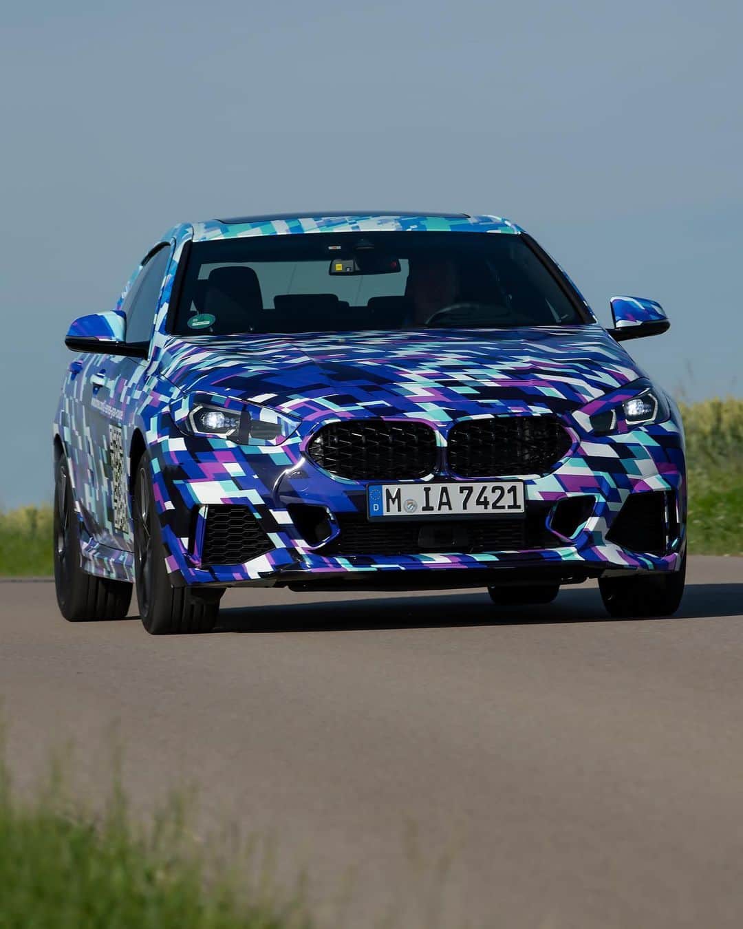 BMWのインスタグラム：「Finally. The first-ever BMW 2 Series Gran Coupe is roaming the streets in a special outfit for its testing phase. Intrigued?  #THE2 #BMW #2Series」