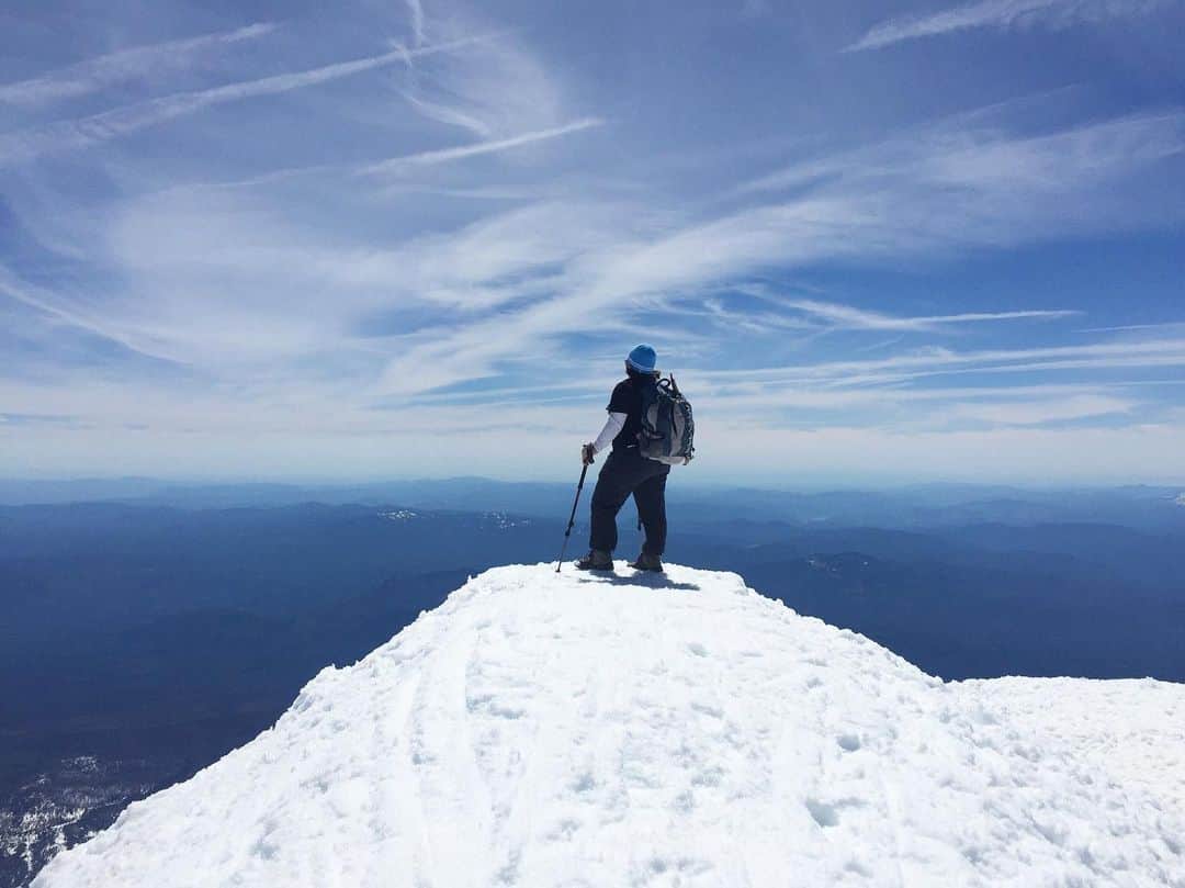 のインスタグラム：「Life can be a climb, but the view is always worth it. Shout out to our colleague Trish (@trishoberhaus) for conquering summits and living her best life. Any guesses where in the world this photo was taken? Tag us @AbbottGlobal for a possible feature. #abbott #lifetothefullest #travel #backpack #adventure #hike #summit #mountain #whereintheworld」