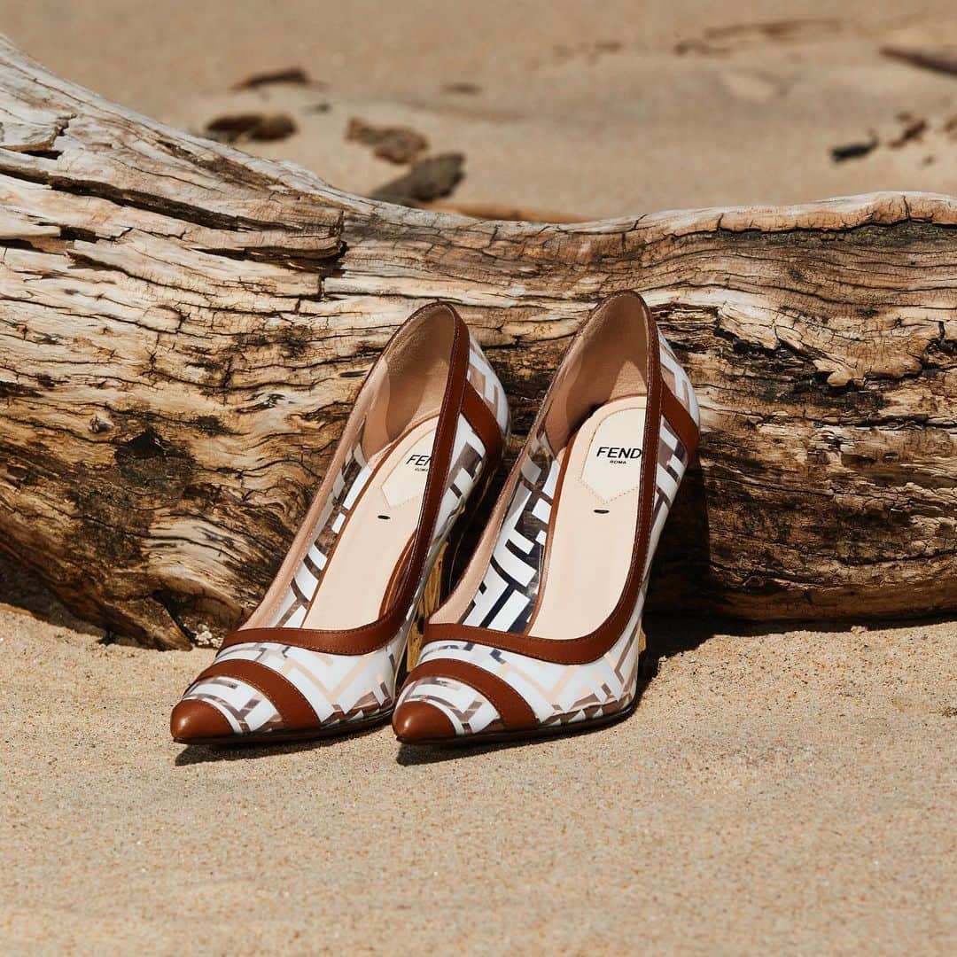 Saks Fifth Avenueのインスタグラム：「@fendi is here to point you towards your next getaway with these summer-approved clear logo pumps. #10022SHOE」