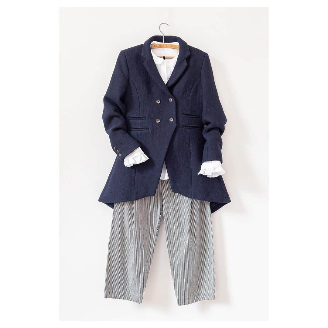 キャベジズ&ローゼズのインスタグラム：「Regale in Tails 💙 Tap to shop a very smart ensemble. The newly arrived navy Flossie Frock Jacket looks extremely smart when worn with the Perdie Shirt in White Seersucker and the Camilla Trousers in Candy Stripe Black 🖤 Made in limited numbers in England, this is a wonderful look that will take you into Autumn #newness #wool #taptoshop #italianwool #summeroutfit #frockcoat #britishfashion #summerwool #cabbagesandroses #cabbagesandrosesfashion @christina_strutt @cabbagesandroses_shop」
