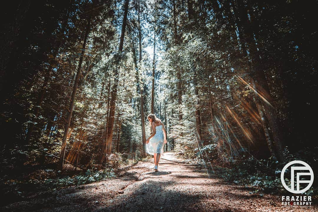 Timo the Fotographerのインスタグラム：「My last two posts took you to the landscapes of Switzerland, and the splendor of Paris.  This is a little different.  While driving around in my Jeep through Germany I suddenly saw a random logging trail.  I could barely make out the scene as I drove past it, but I knew I had to stop.  I had my forever model @handsome.hailey change wardrobe and pose as I directed her.  The light was barely shining through the trees.  This photo is the outcome. _________  For this series of photos I'm focusing on leading lines.  Although each of these three shots were very different they are all using lines to draw you into the image.  _________  #fantim #frazierfotography #fantimFotography #landscape #wanderlust #composition #canon #lovetravel #igers #europa #traveldestination #travelgram #germany」