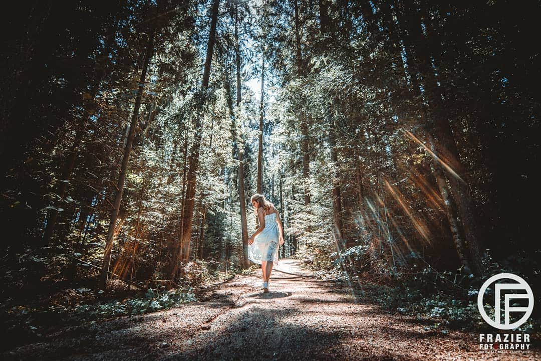 Timo the Fotographerさんのインスタグラム写真 - (Timo the FotographerInstagram)「My last two posts took you to the landscapes of Switzerland, and the splendor of Paris.  This is a little different.  While driving around in my Jeep through Germany I suddenly saw a random logging trail.  I could barely make out the scene as I drove past it, but I knew I had to stop.  I had my forever model @handsome.hailey change wardrobe and pose as I directed her.  The light was barely shining through the trees.  This photo is the outcome. _________  For this series of photos I'm focusing on leading lines.  Although each of these three shots were very different they are all using lines to draw you into the image.  _________  #fantim #frazierfotography #fantimFotography #landscape #wanderlust #composition #canon #lovetravel #igers #europa #traveldestination #travelgram #germany」7月27日 0時04分 - foto.timo