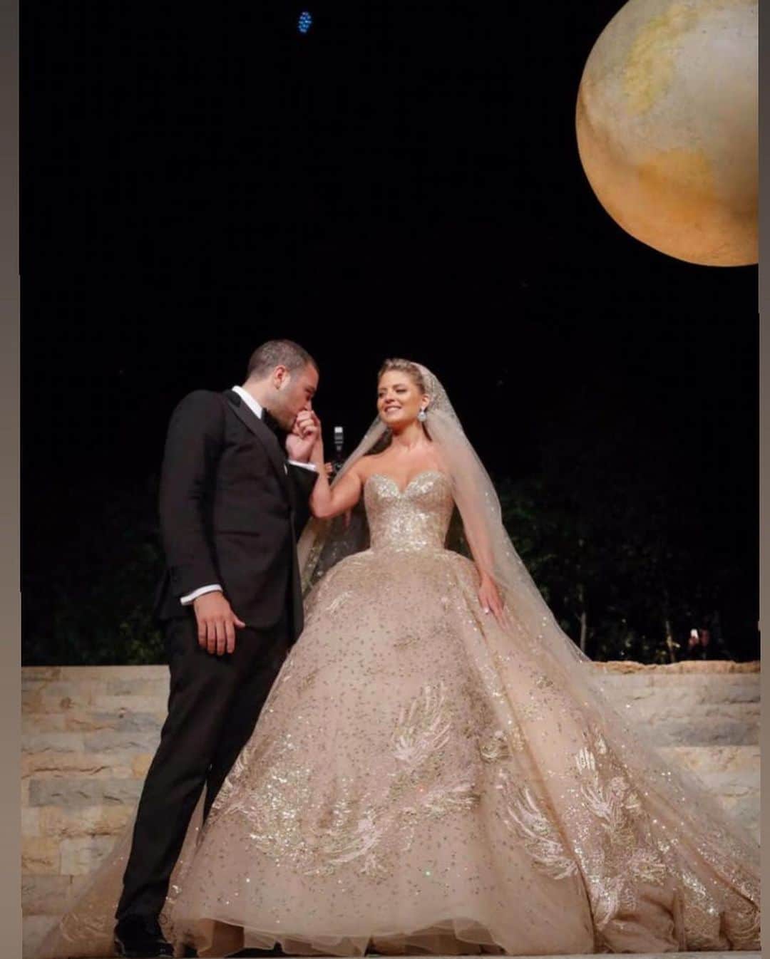 Wedding ?さんのインスタグラム写真 - (Wedding ?Instagram)「Over the last weekend, Elie Saab Jr., the son of Lebanese fashion designer Elie Saab, and his partner, Christina Mourad, tied the knot in a three-day celebration held in the mountain resort of Faqra in Lebanon, surrounded by family and friends. - Mourad wore a total of four fabulous Elie Saab gowns over the course of the celebration, two of which were custom made for her by her father-in-law himself – one for their traditional Lebanese wedding ceremony, and the other for main reception dinner. - Christina wore an Elie Saab Haute Couture custom sleeveless tulle embroidered gown made of ivory silk and champagne lurex threads embellished with 500,000 sequins, a high neck bodice and a 4.5 metre train. Twelve embroiderers, three pattern-makers, six tailors and 10 petites mains worked on the gown. - In total, it required 450 hours of embroidery, 200 hours of tailoring and 80 hours of embroidery design. ❤️❤️❤️ . . . . . . . . .  #dress #makeup #hairstyle #vestido #weddingdecor #decoracaocasamento #justmarried #weddingtrends #wedding #bride #bridetobe #noiva  #vestidodenoiva #weddingdress #weddinggown  #casamento #honeymoon #luademel #destinationwedding #eliesaab」7月27日 20時56分 - weddingideas_brides