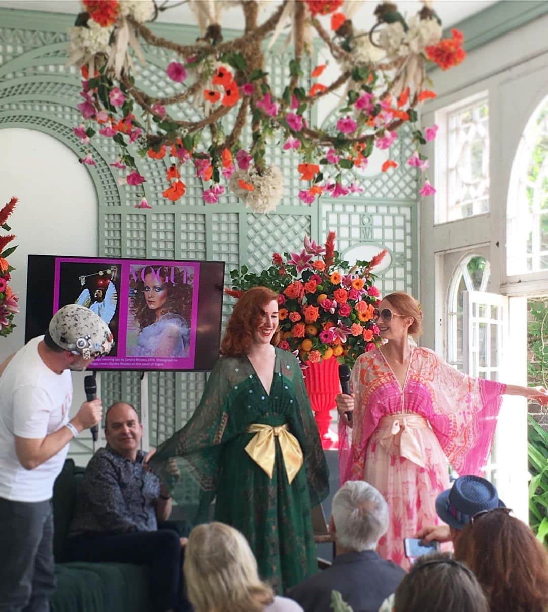 のインスタグラム：「Here I am at @porteliotfestival discussing @zandra_rhodes_ with @nj_stevenson #fieldoflilies print and how the print repeats inform the cut and drape!! See more this autumn at @fashiontextilemuseum in #50yearsofFABULOUS curated AND captured in a new book by @dennisnothdruft」
