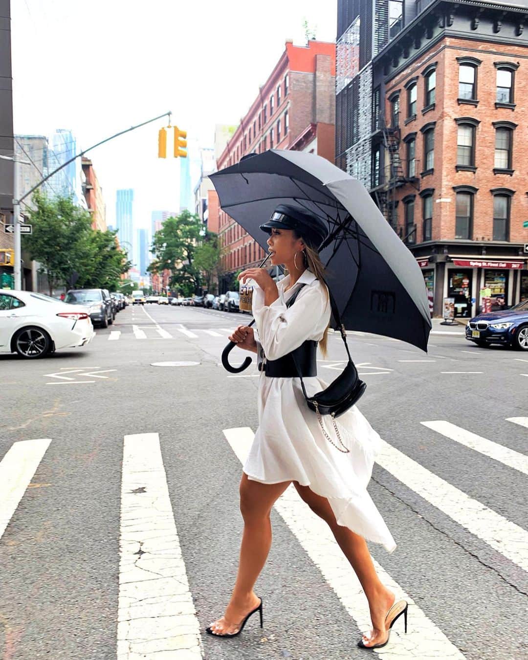 リアン Vのインスタグラム：「Rain or shine everyday is a blessing! ☔️ Styled by: @stephgregstyles  Hat: @ruslanbaginskiy_hats  Dress: @shopakira  Heels: @misslolaofficial」